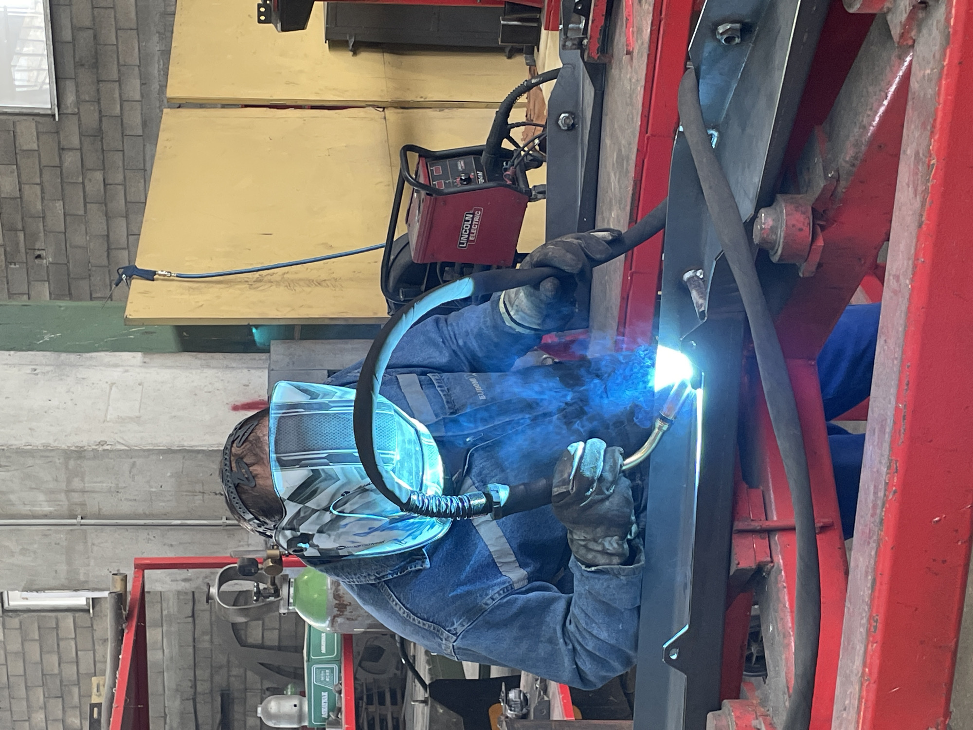 Welder observed working in workshop in Čeluga, Montenegro
