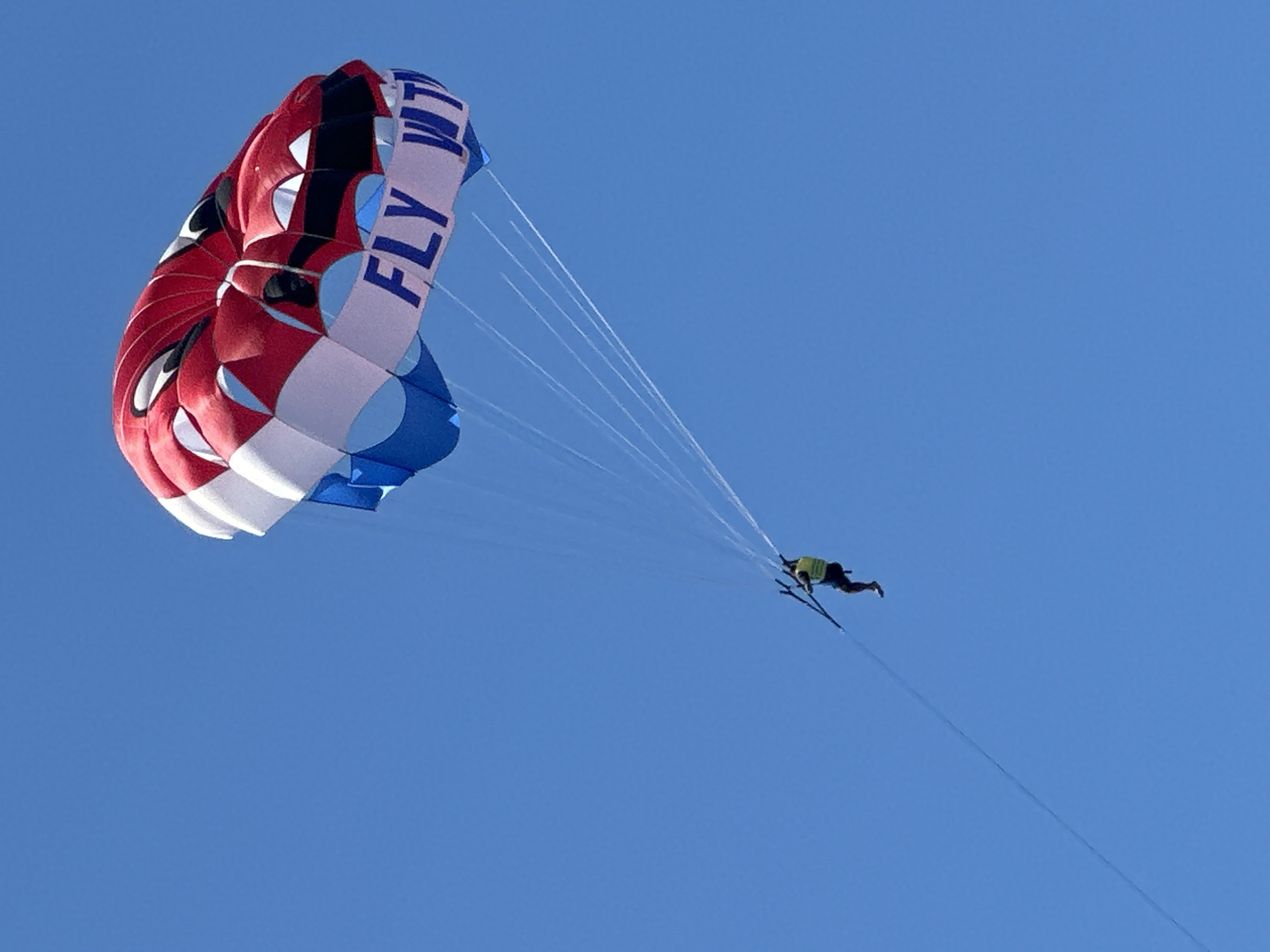 Parasailing and beach activities captured in Budva, Montenegro