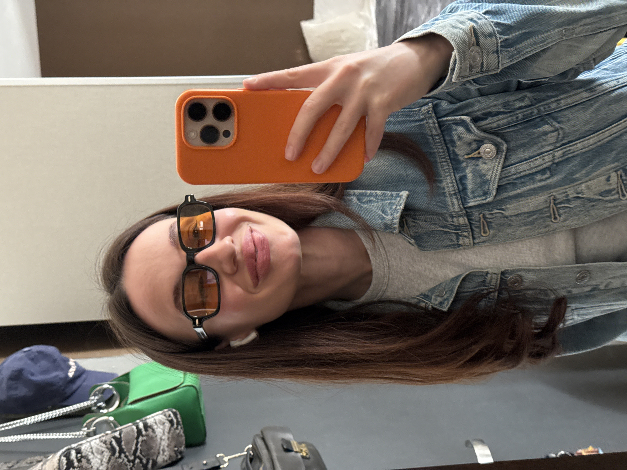 Woman takes multiple selfies across Tel Aviv locations