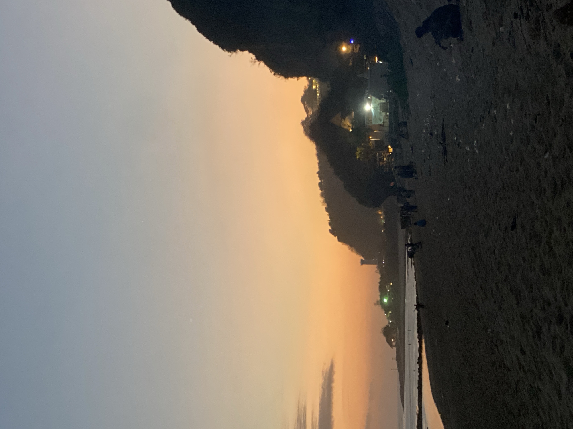 Birthday beach gathering in Kuta Selatan with food, ocean, and festivities