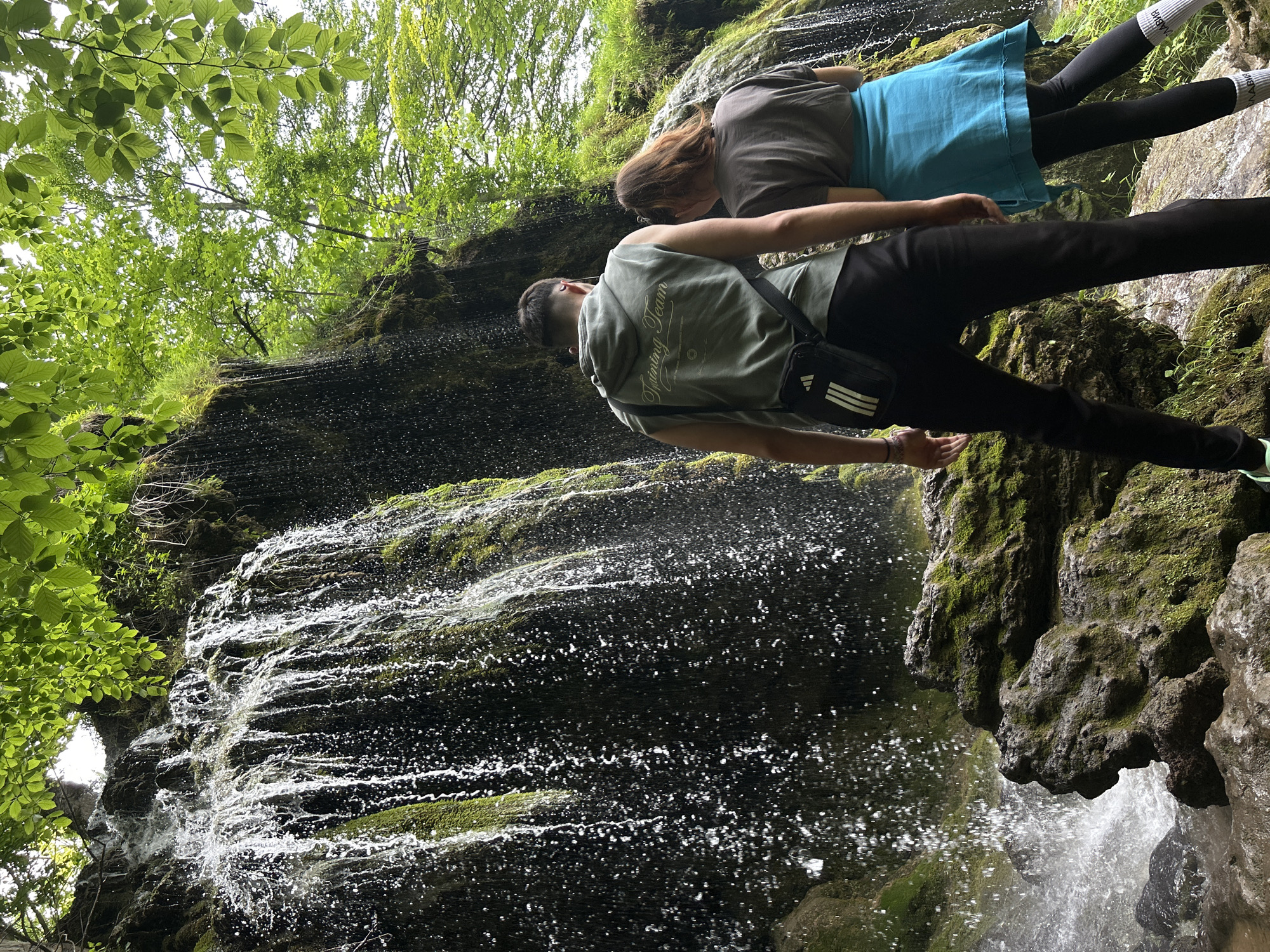 Nature enthusiasts explore forests and waterfalls during morning hours