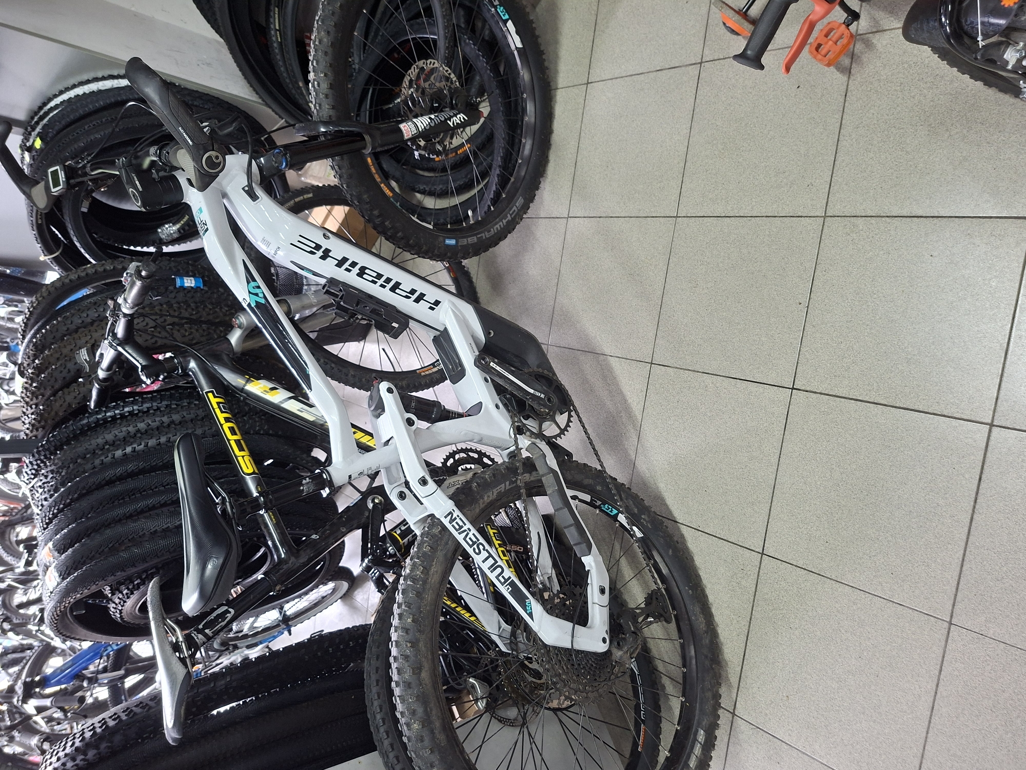 White electric bicycle spotted parked indoors in Gabrovo, Bulgaria