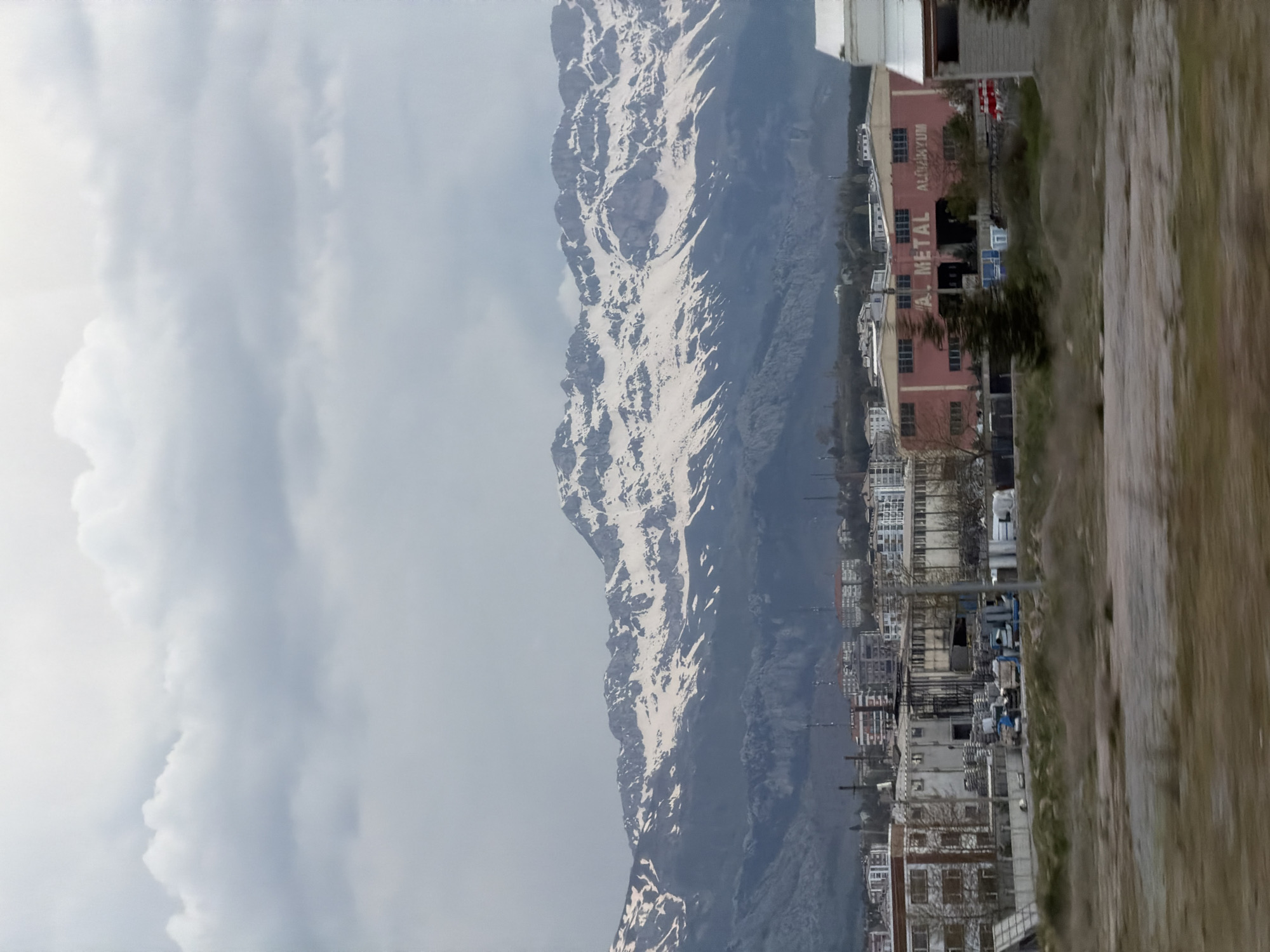 Snow-capped mountains photographed under overcast skies in Seydişehir, Turkey