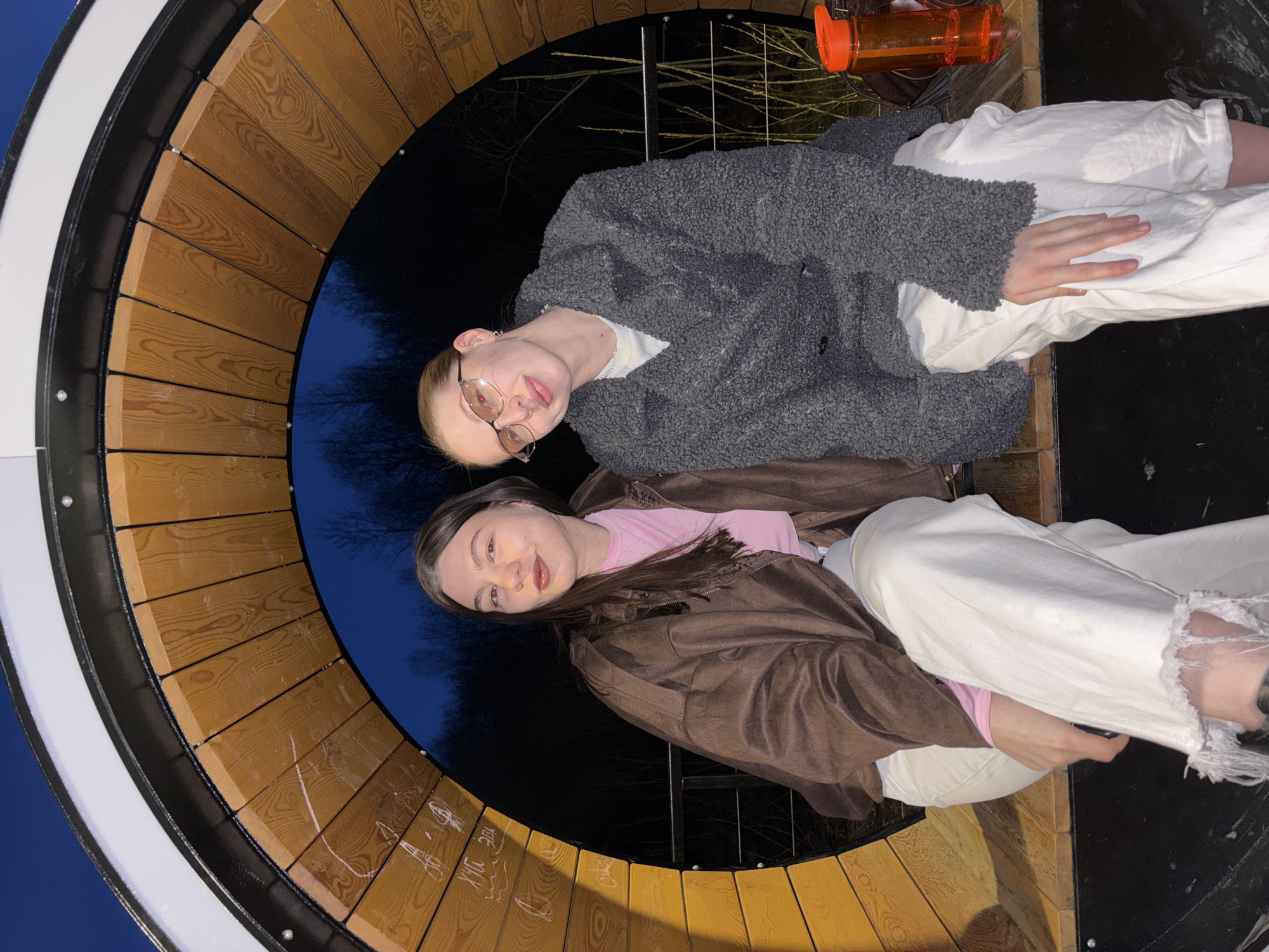 Young women photographed at outdoor structures in Perm
