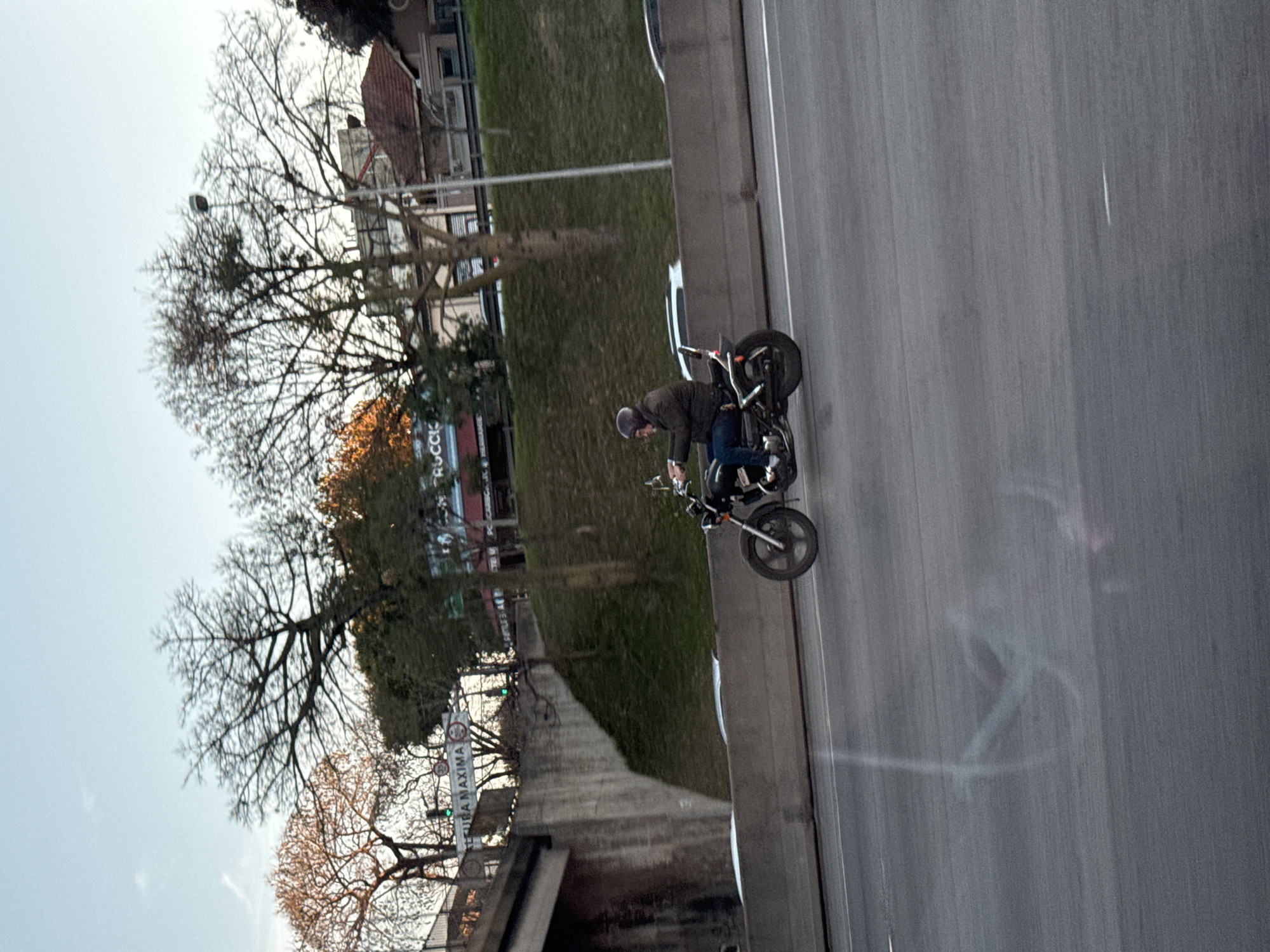Motorcyclist travels highway in Vicente López, Argentina