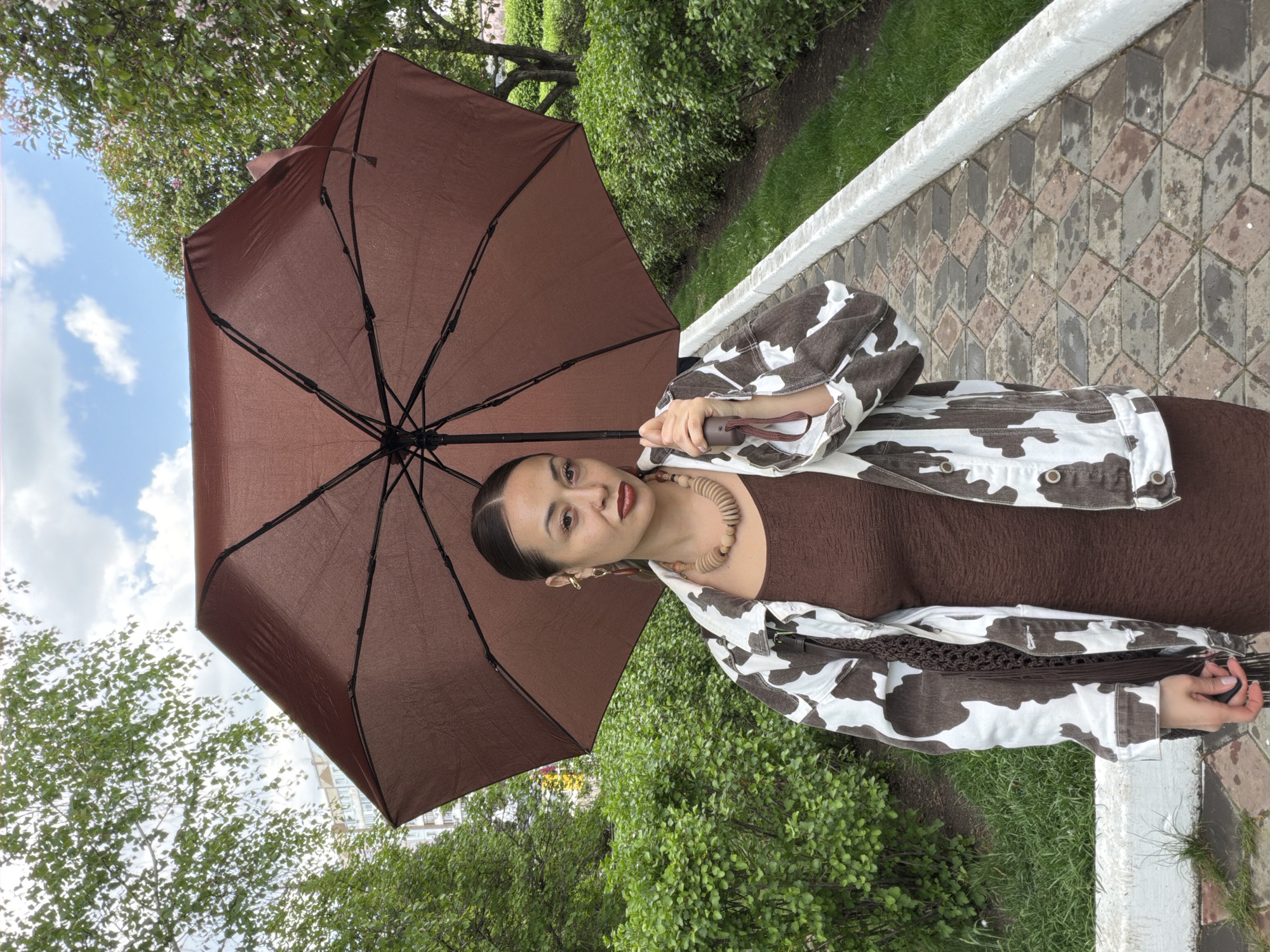 Woman in cow-print jacket photographed in Krasnoyarsk park