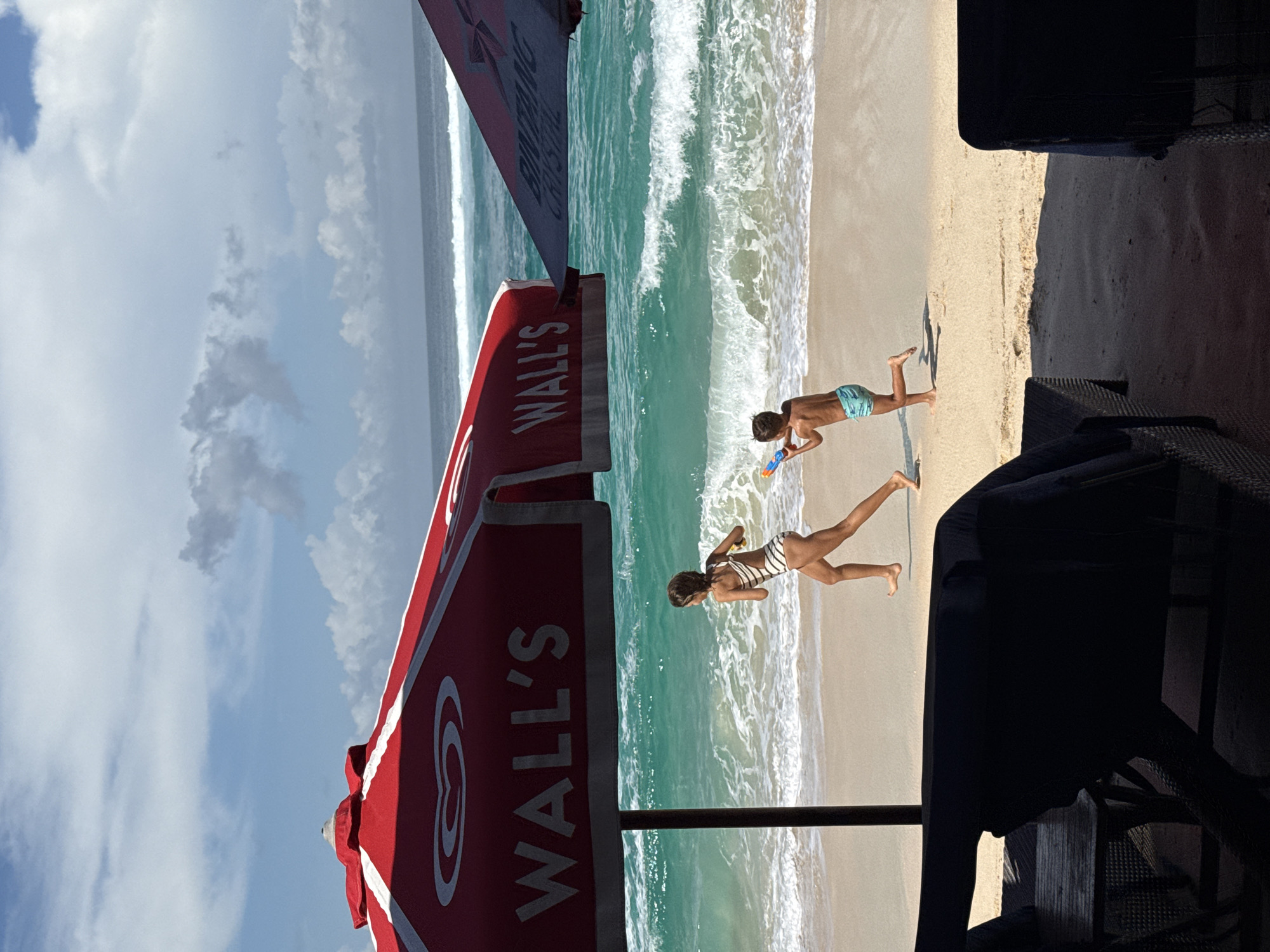Family beach day captured in Kuta Selatan Indonesia