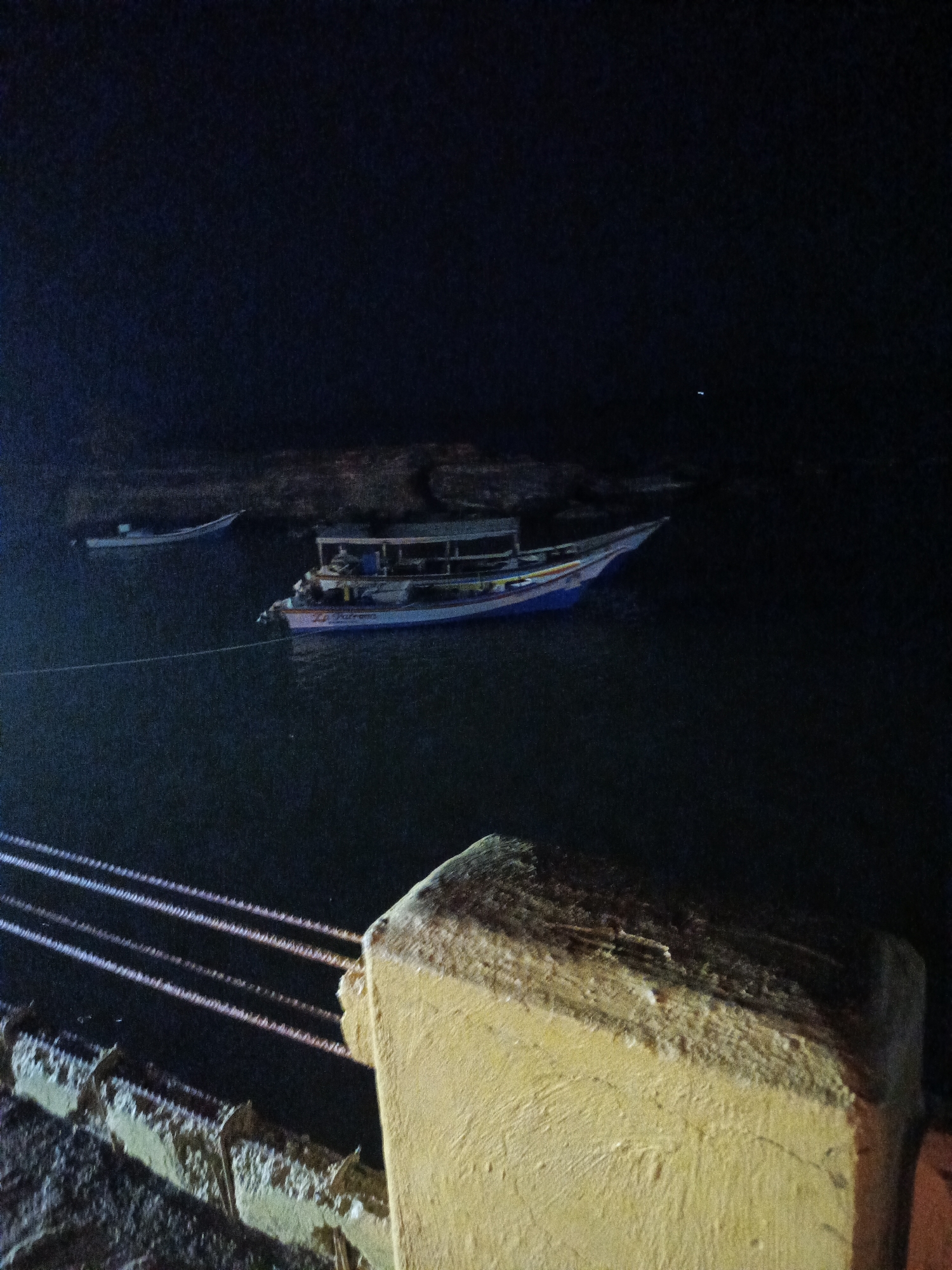 Nighttime waterfront scenes captured in Juan Griego, Venezuela bay area