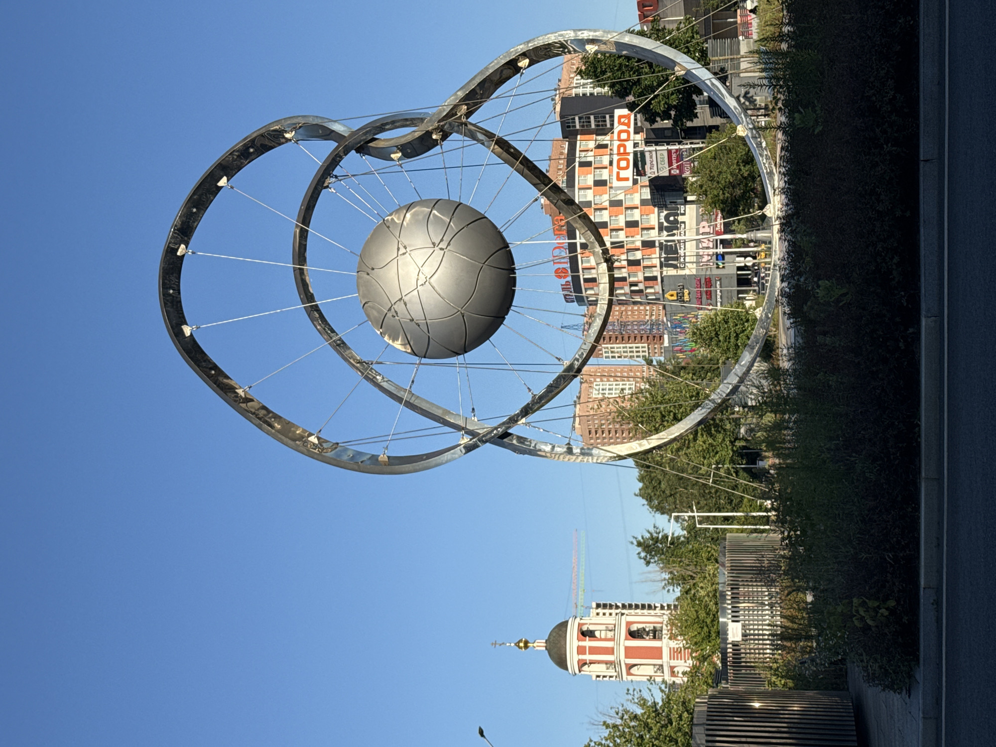 Abstract metallic sculpture with interlocking rings in Moscow