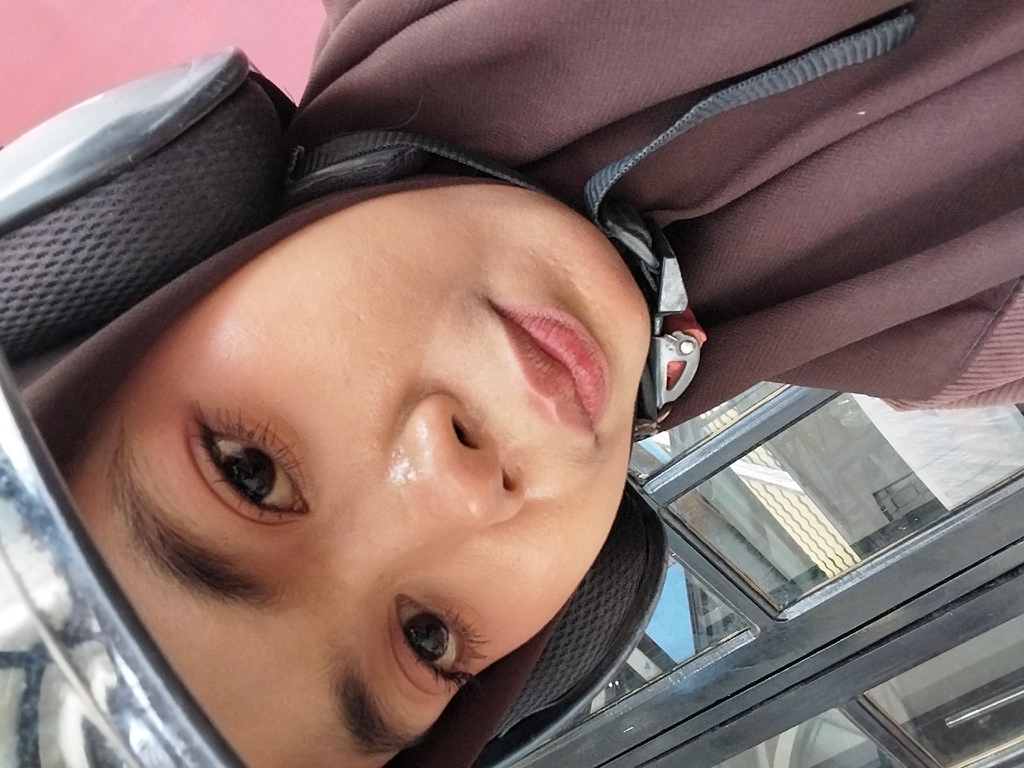 Helmet selfies snapped on a morning ride in Sulawesi