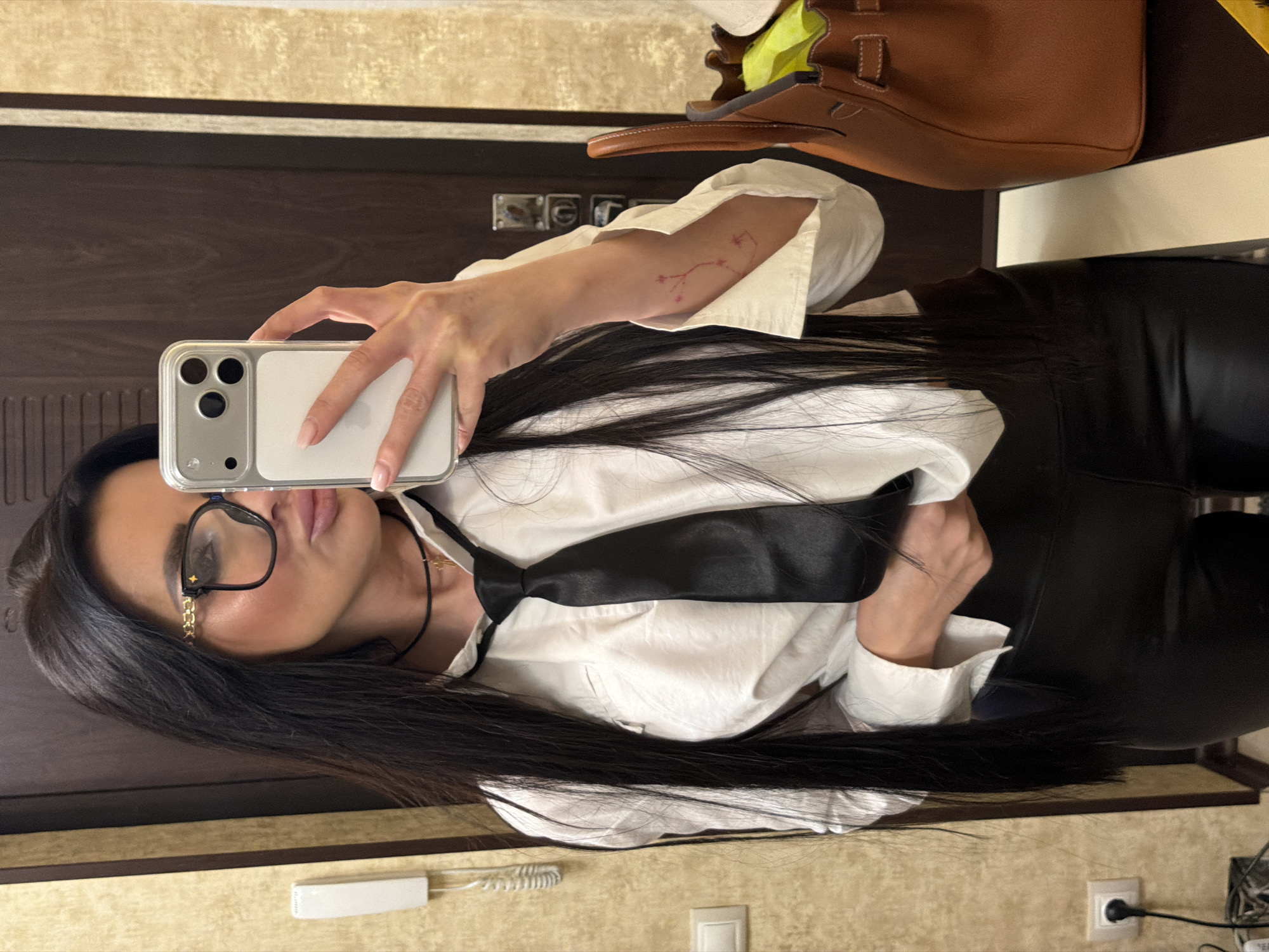 Woman Takes Mirror Selfie in Voronezh Room