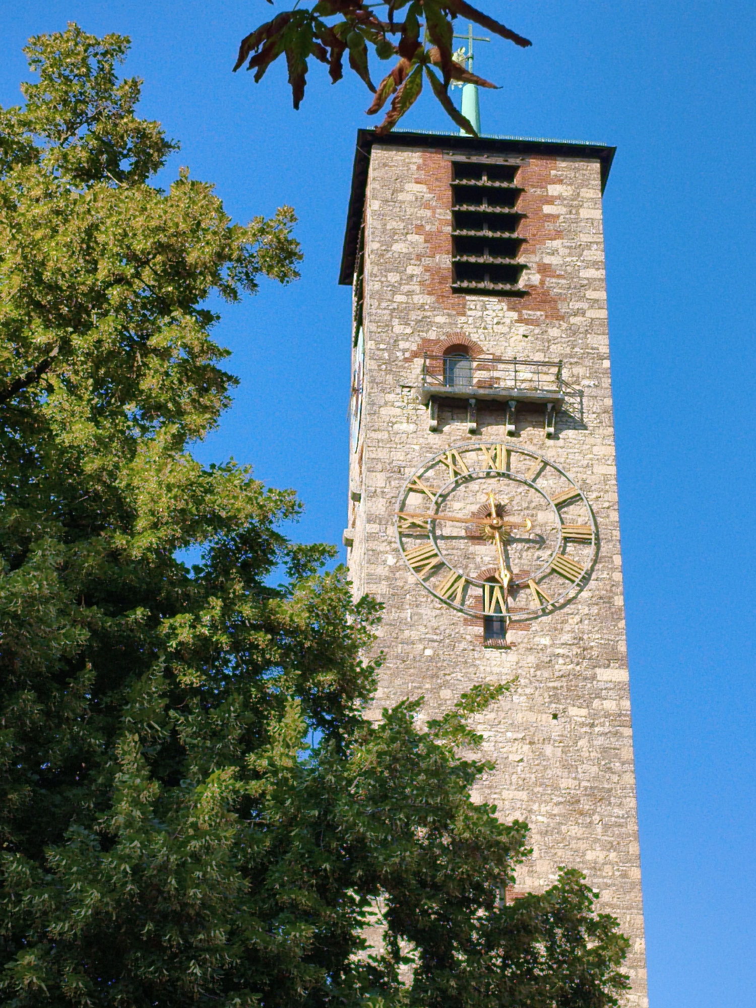 Bamberg's Regnitz riverfront and St. Martin's Church on a clear summer day