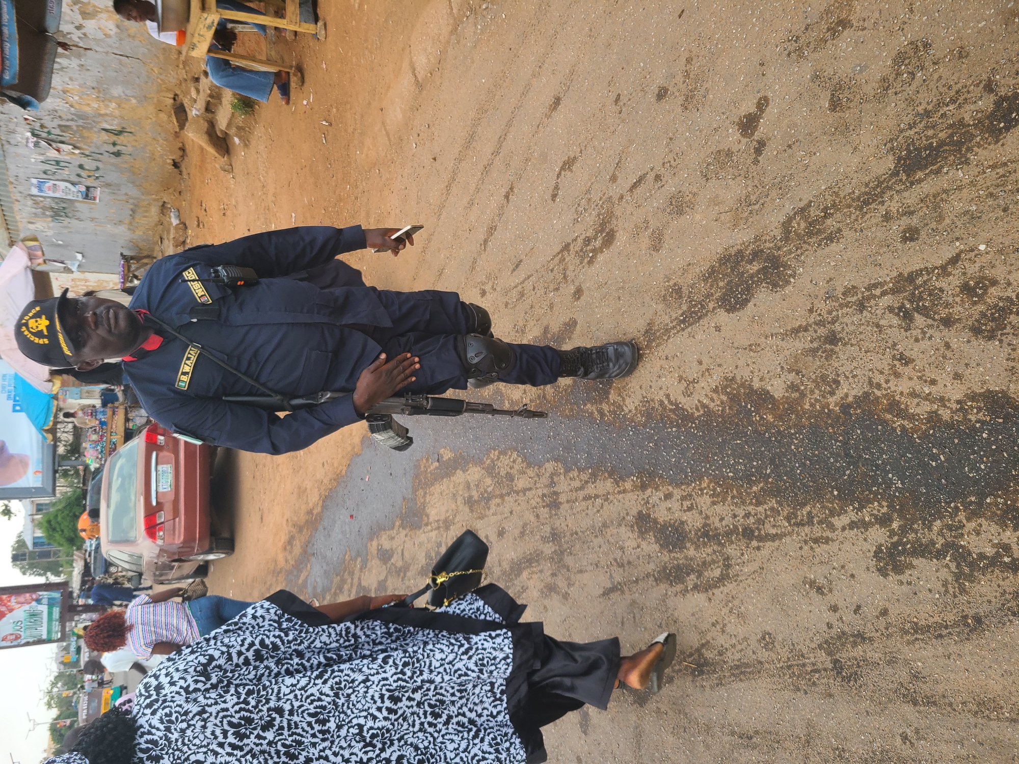 Street activity including armed police presence observed in Jos