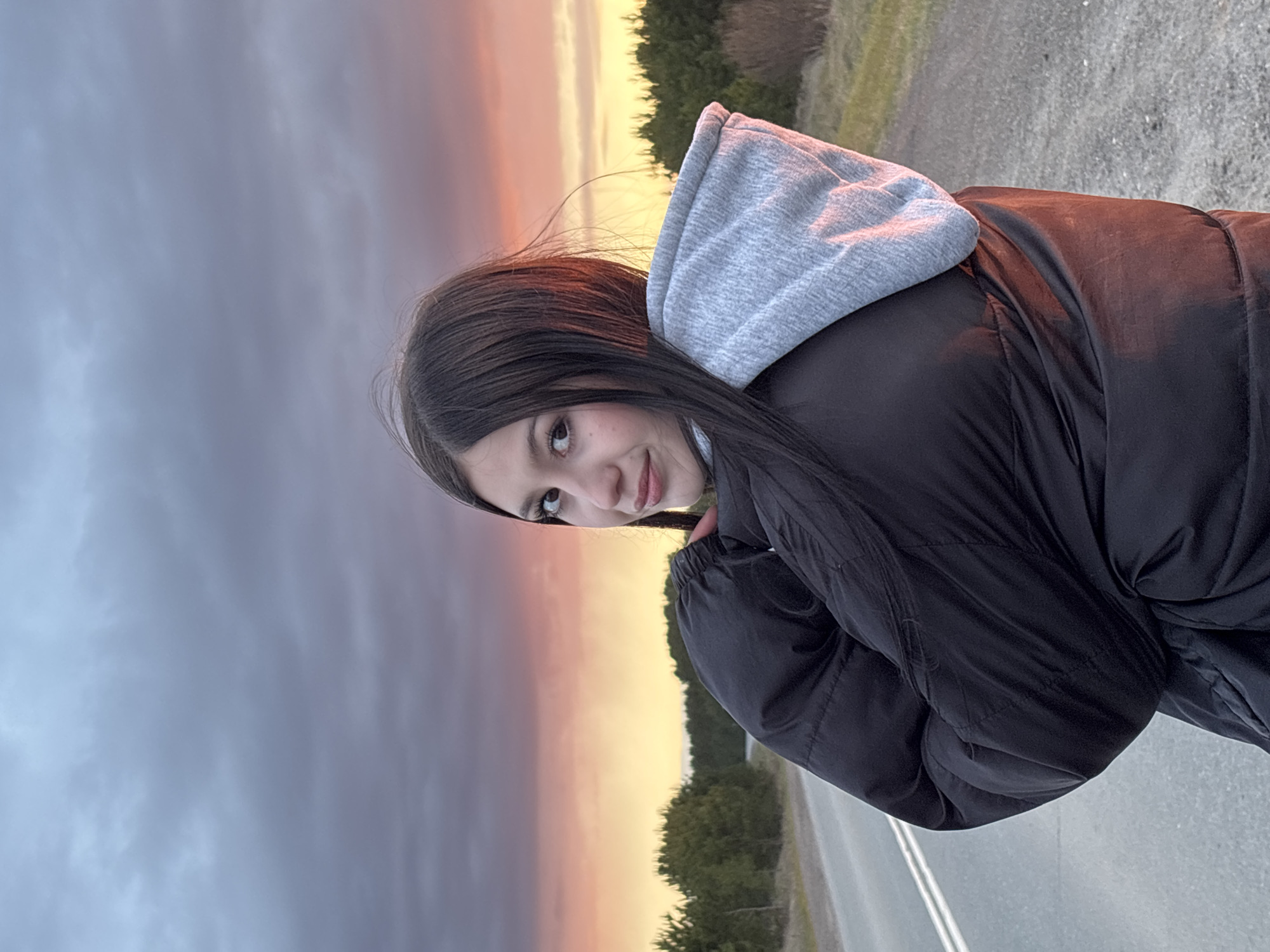 Woman photographed outdoors during twilight in Фоки, Russia