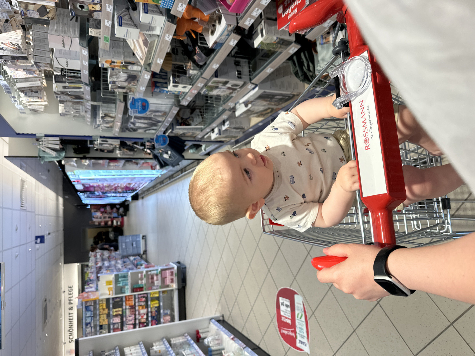 Baby's morning routine captured during family shopping trip in Germany