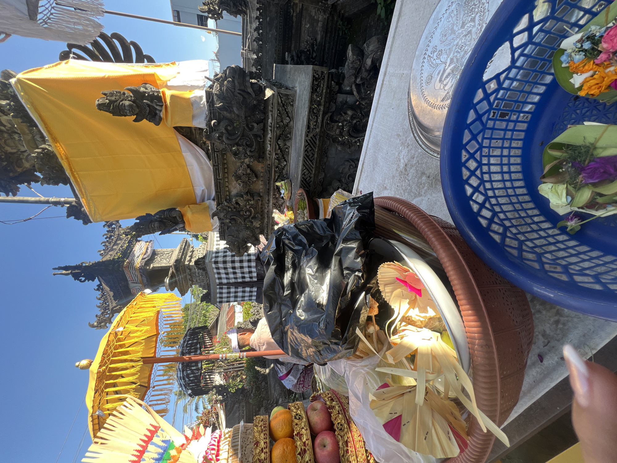 Traditional offerings and ceremony at a Baturiti temple