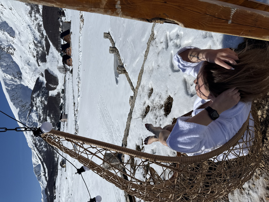 Woman documents winter retreat with dog in Montenegro mountains