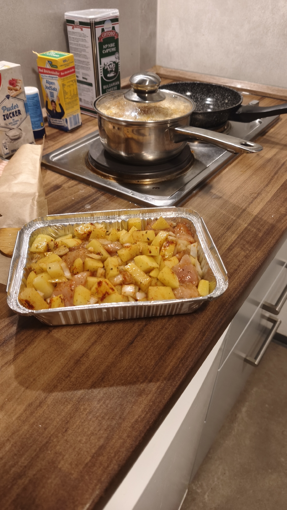 Home cook prepares chicken and potato dinner