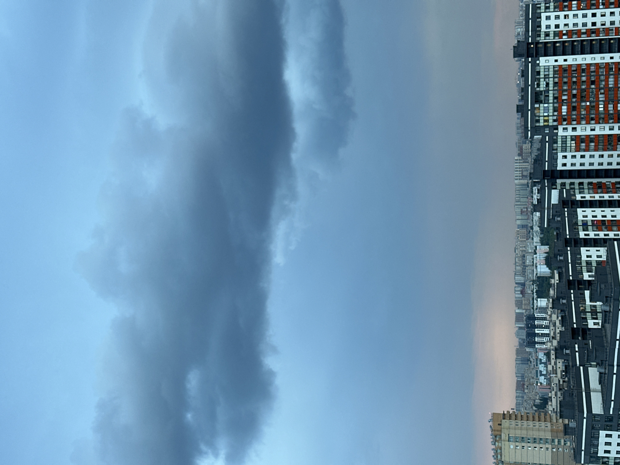Stormy evening sky settles over a dense Russian cityscape