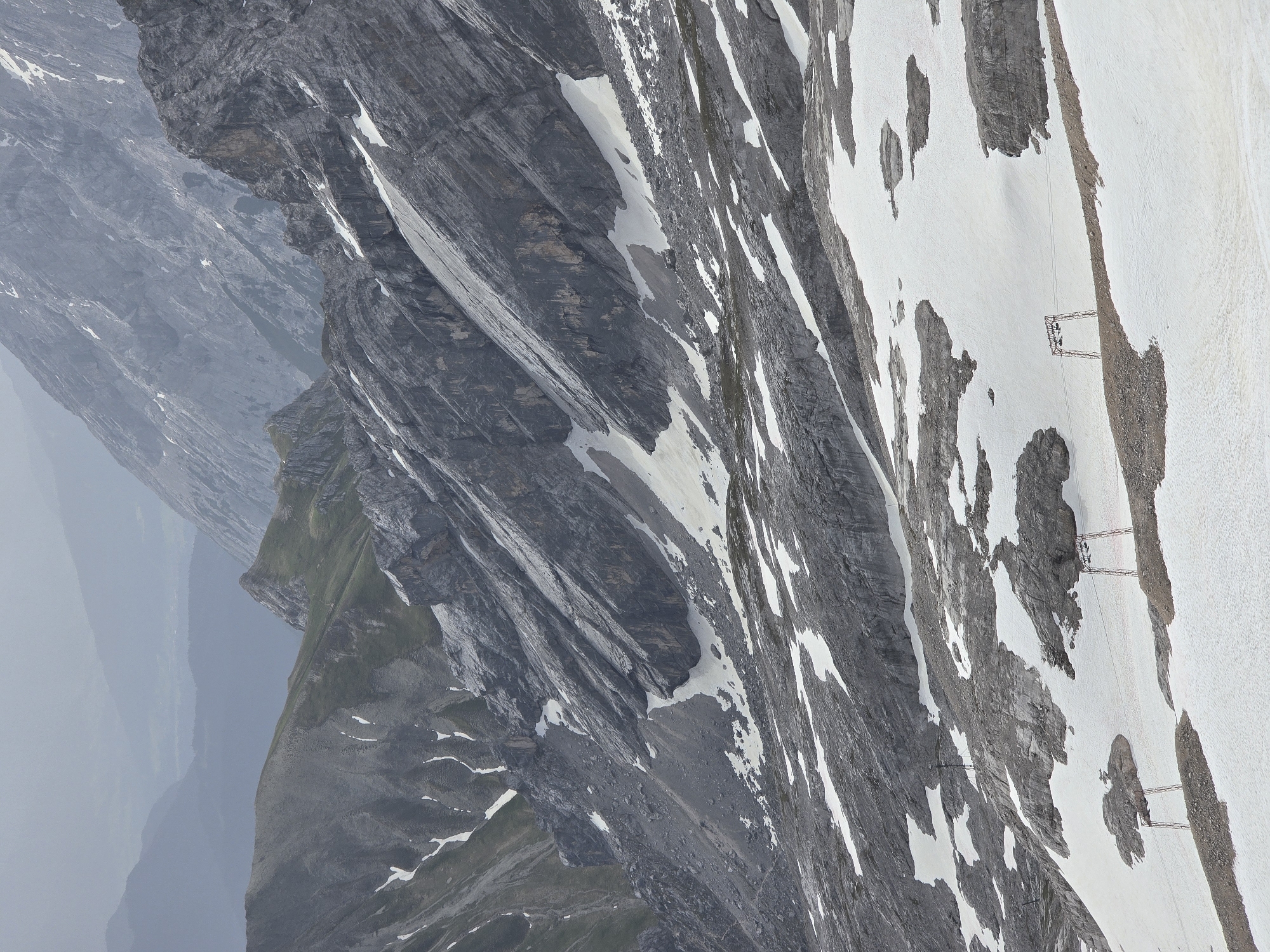 Zugspitze in June: snow, a helicopter, and mountain work underway