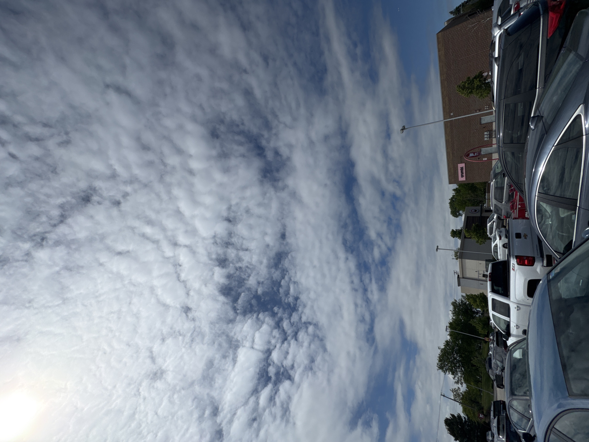 Cloudy evening parking lot observed in Glendale Heights