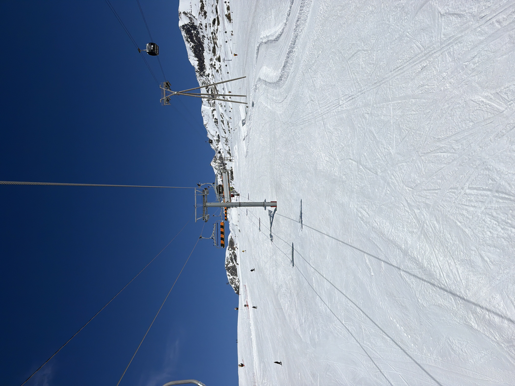 Skiers active on slopes at Huez resort, France
