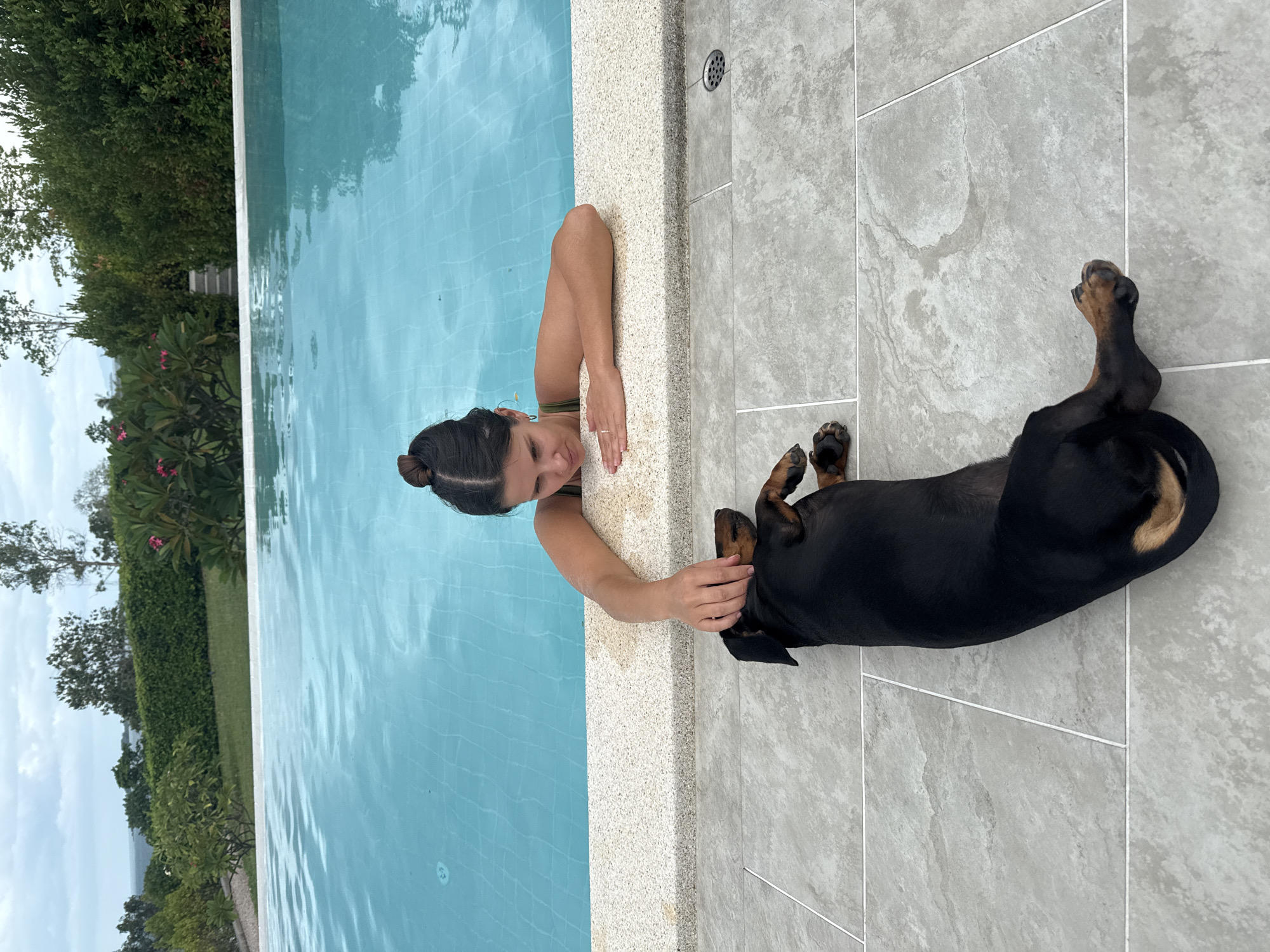 Resort morning in Ko Samui: pool, selfies, and a sleepy dachshund
