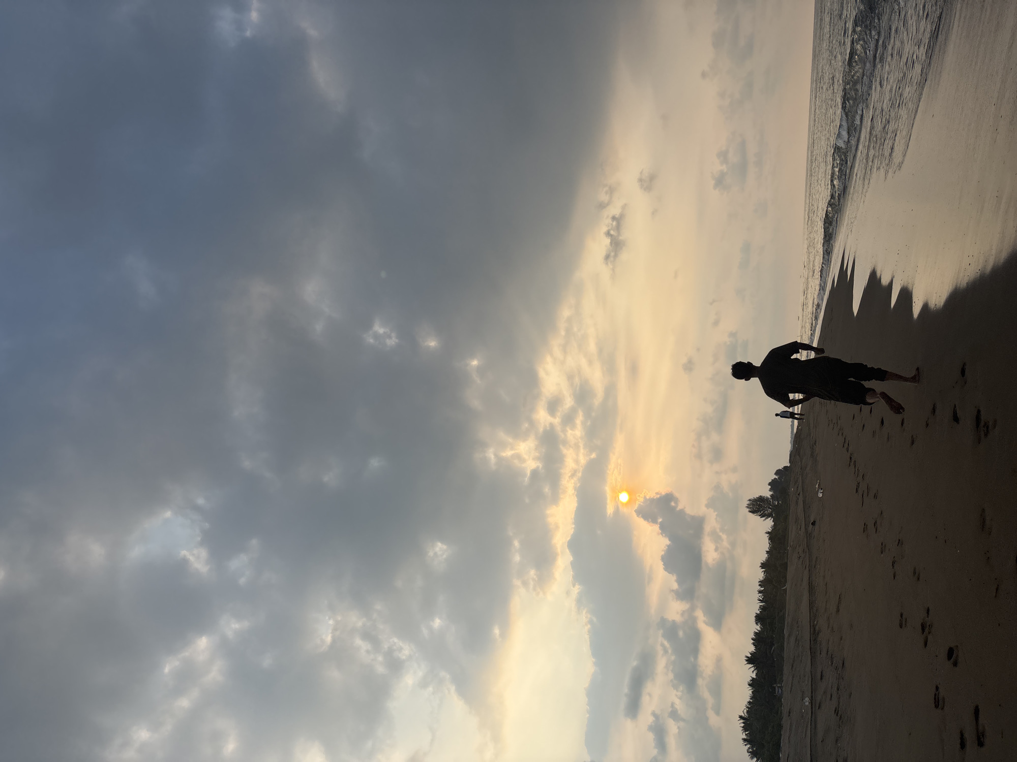 Sunset beach scene photographed in Angkleng Barat, Indonesia