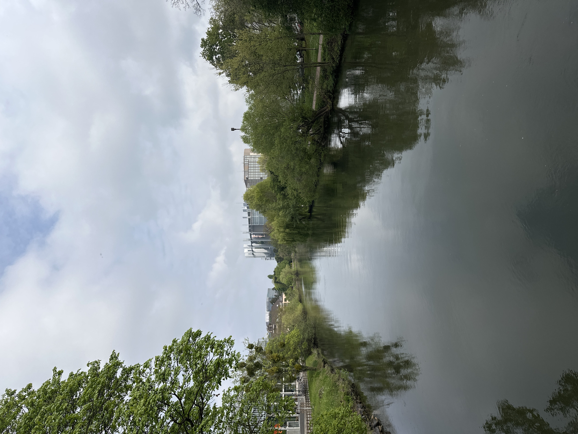 Morning pedestrian activity captured along Strasbourg waterways, residential streets