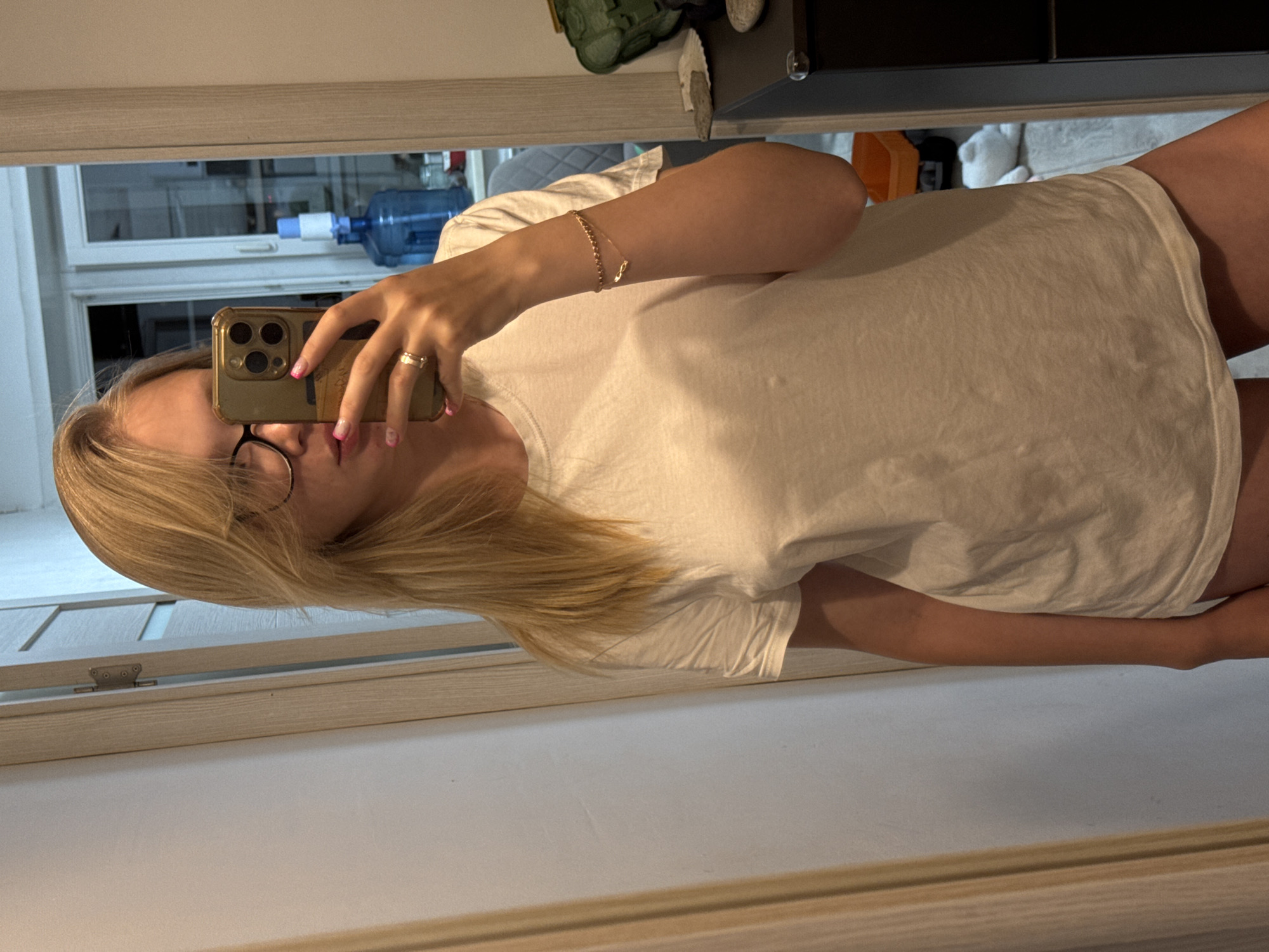 Woman takes mirror selfie in Chaikovsky, Russia