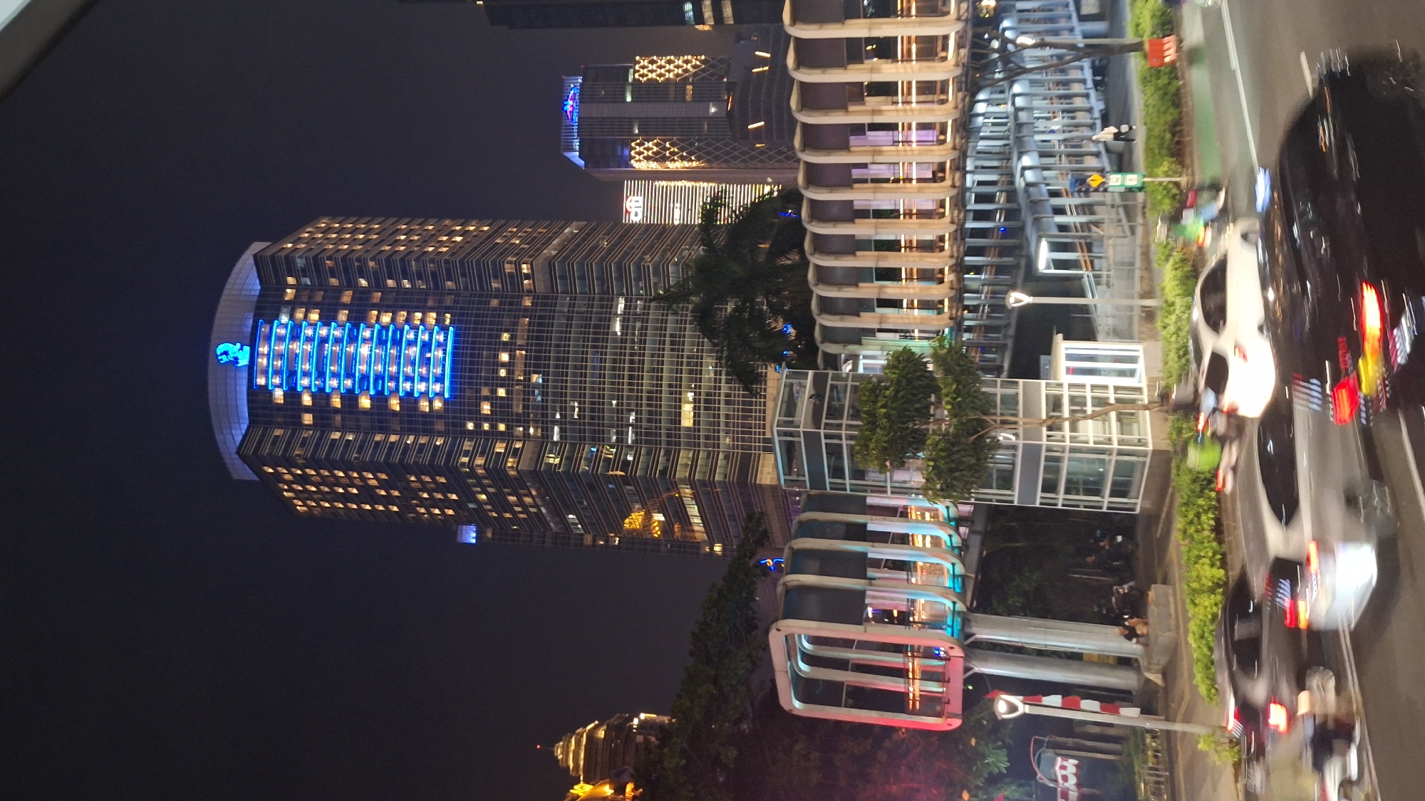 Nighttime festival with stages, displays documented in Central Jakarta