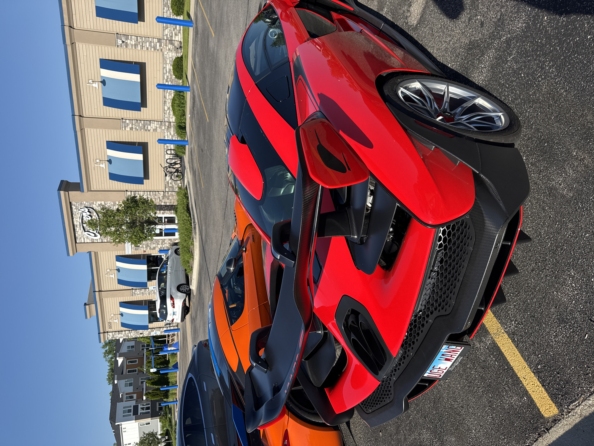 Luxury sports cars gather in Warrenville parking lot