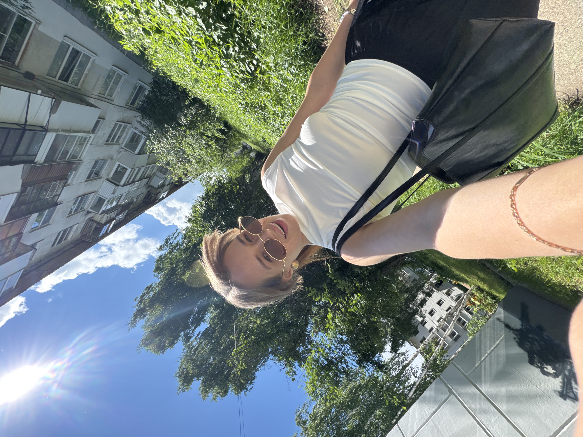 Woman documents morning with selfies and flowers in Chaikovsky