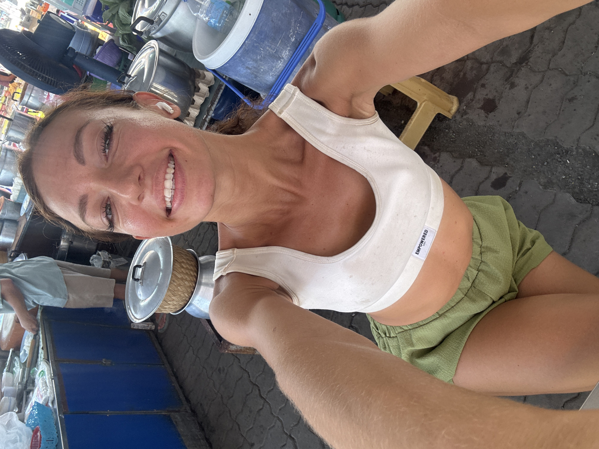 Woman visits street food vendor in บ้านบางรักษ์, Thailand