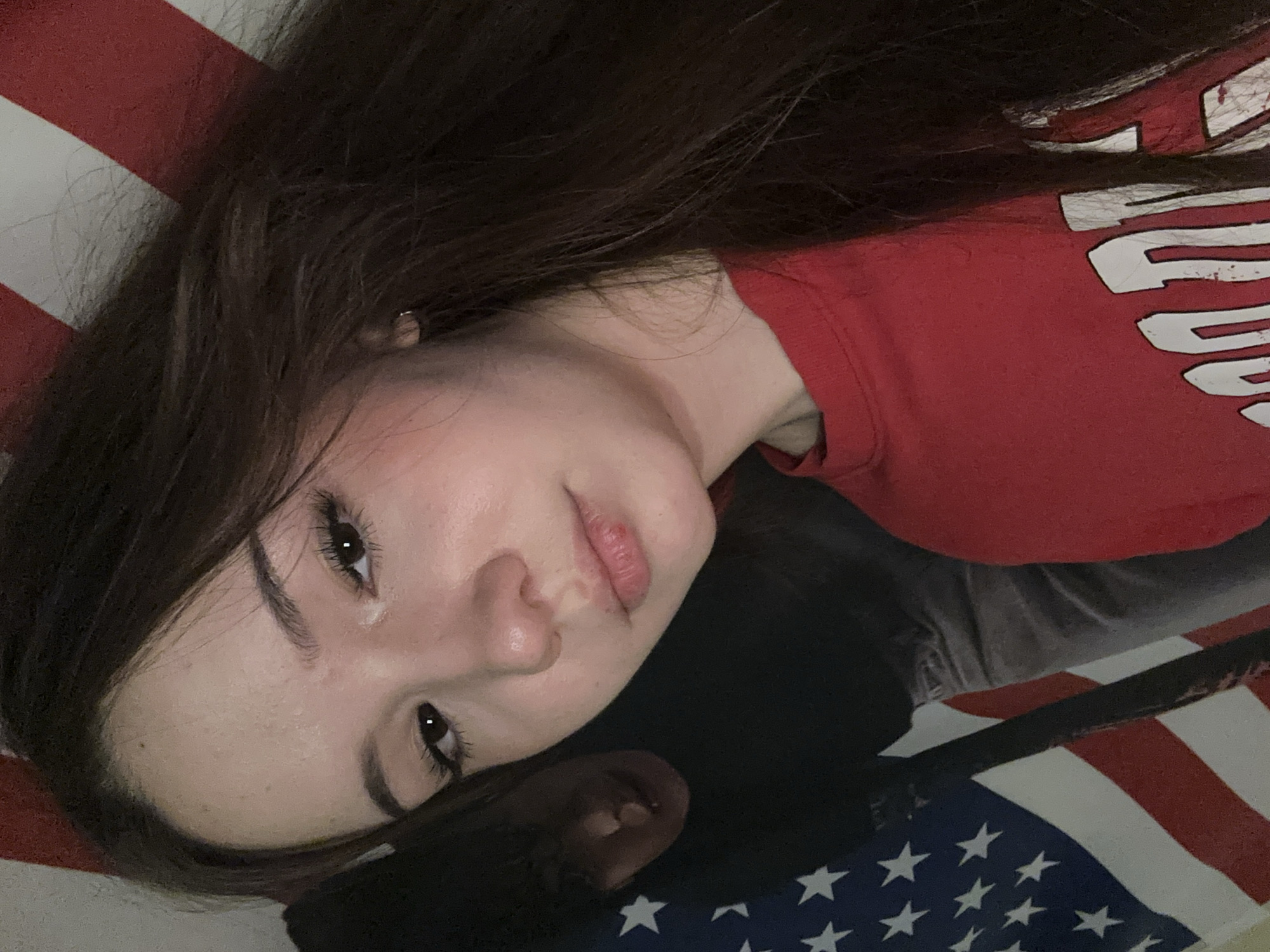Woman takes selfies with American flag in Russian city