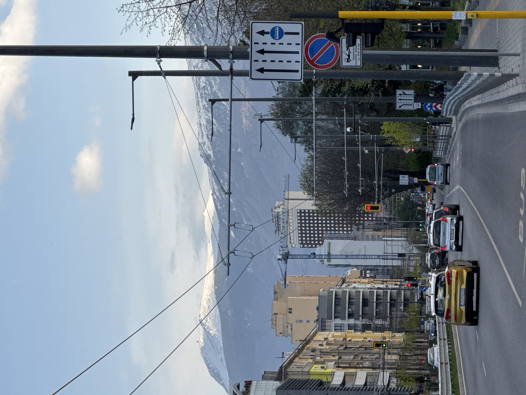 Traffic flows on Sofia street with mountain backdrop