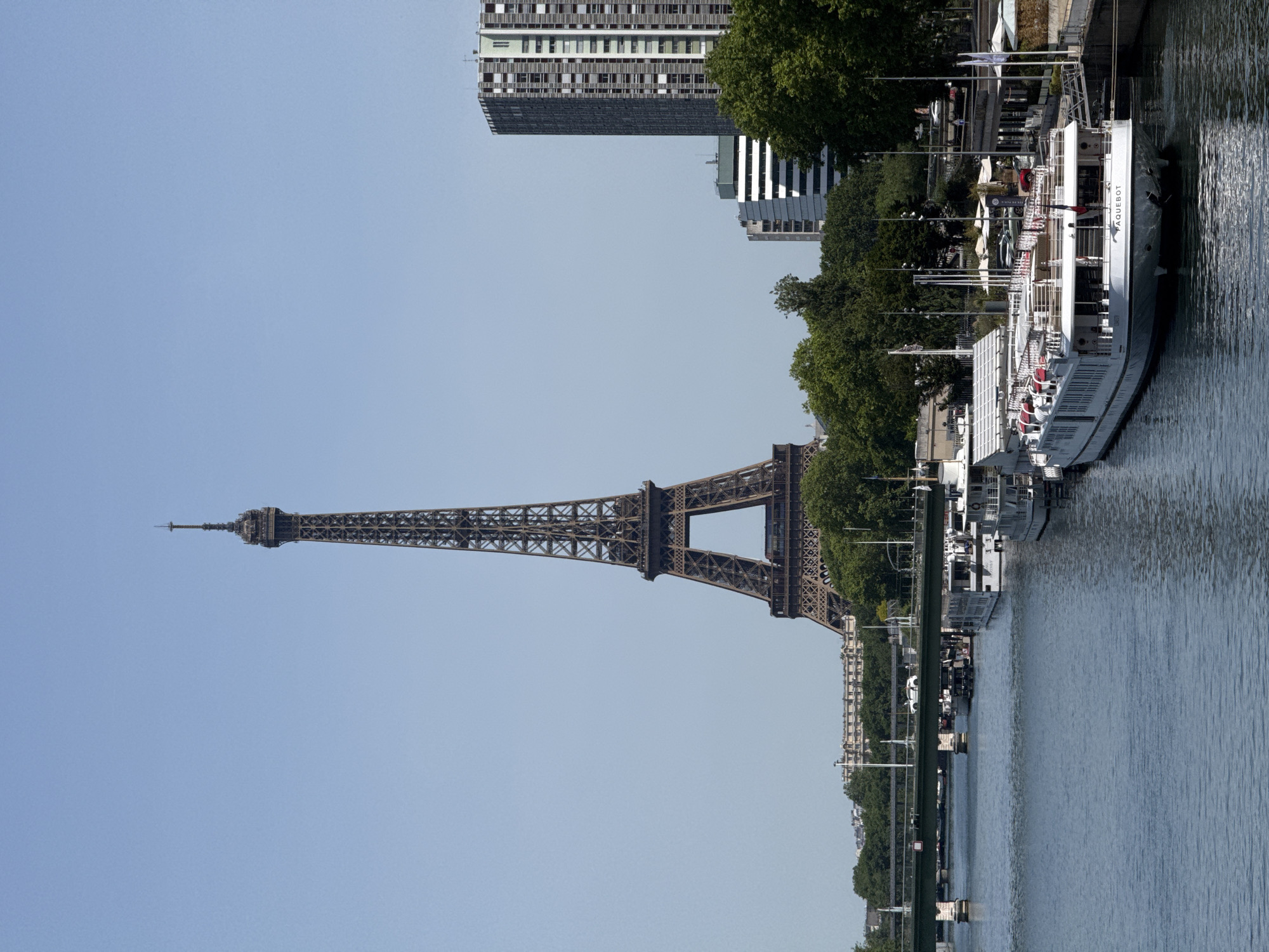 Tourist captures classic Paris views including Eiffel Tower, Seine