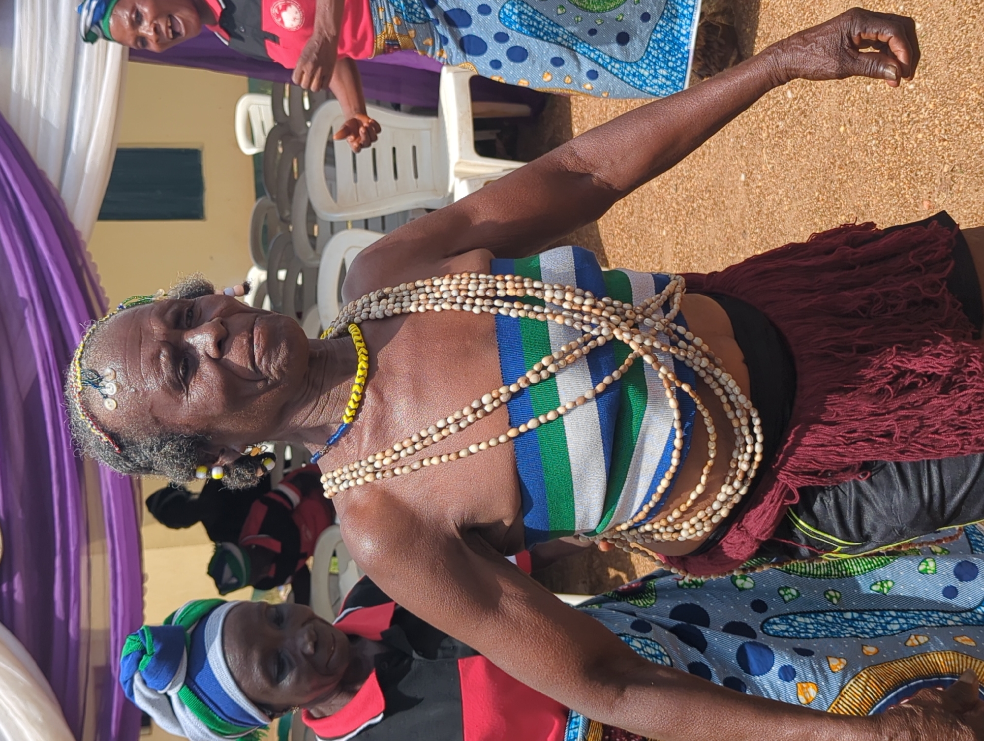 Traditional dance celebration with food service in Maigizo, Nigeria