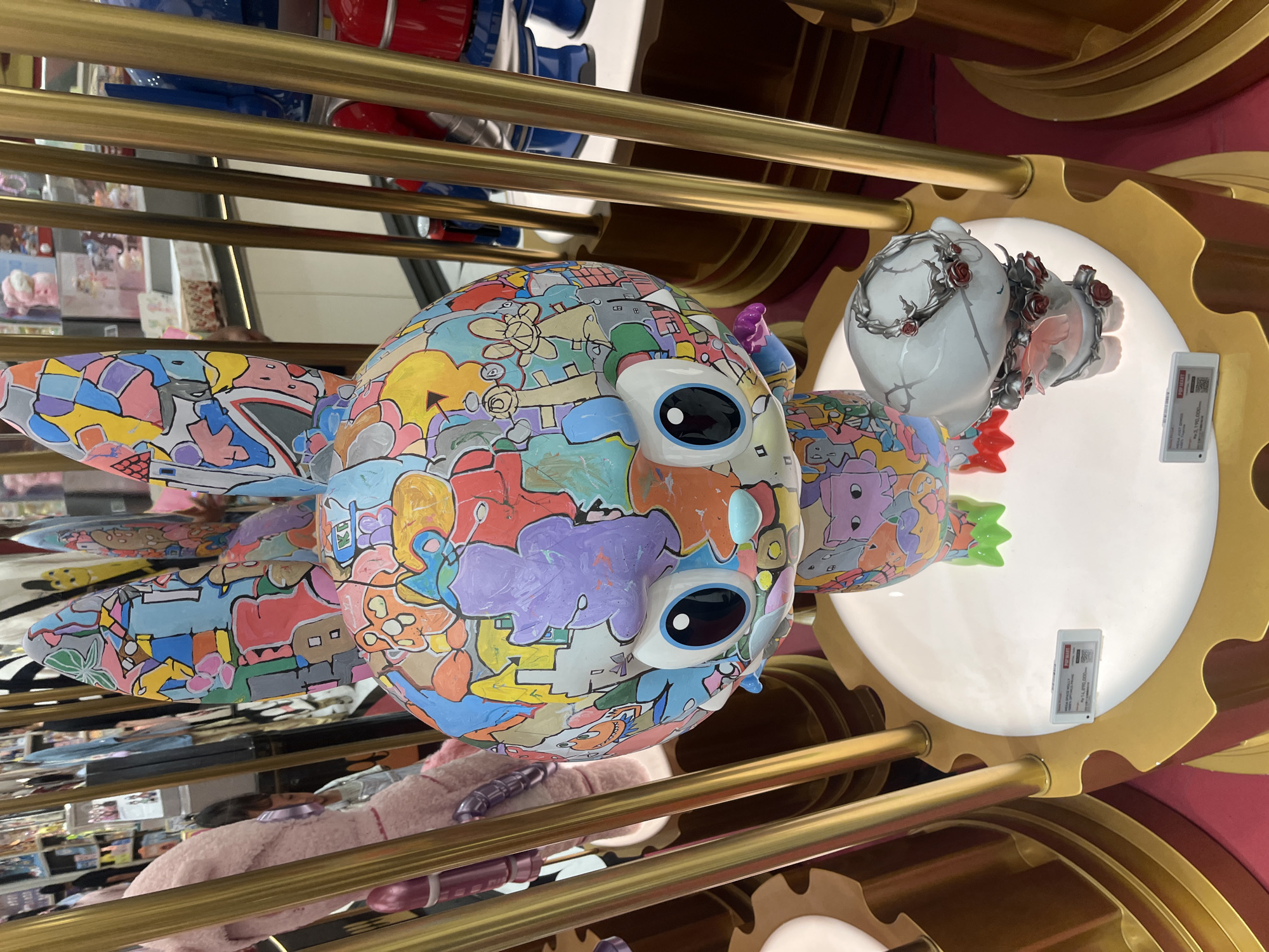 Shopper documents toy stores and luxury retail at Jakarta mall