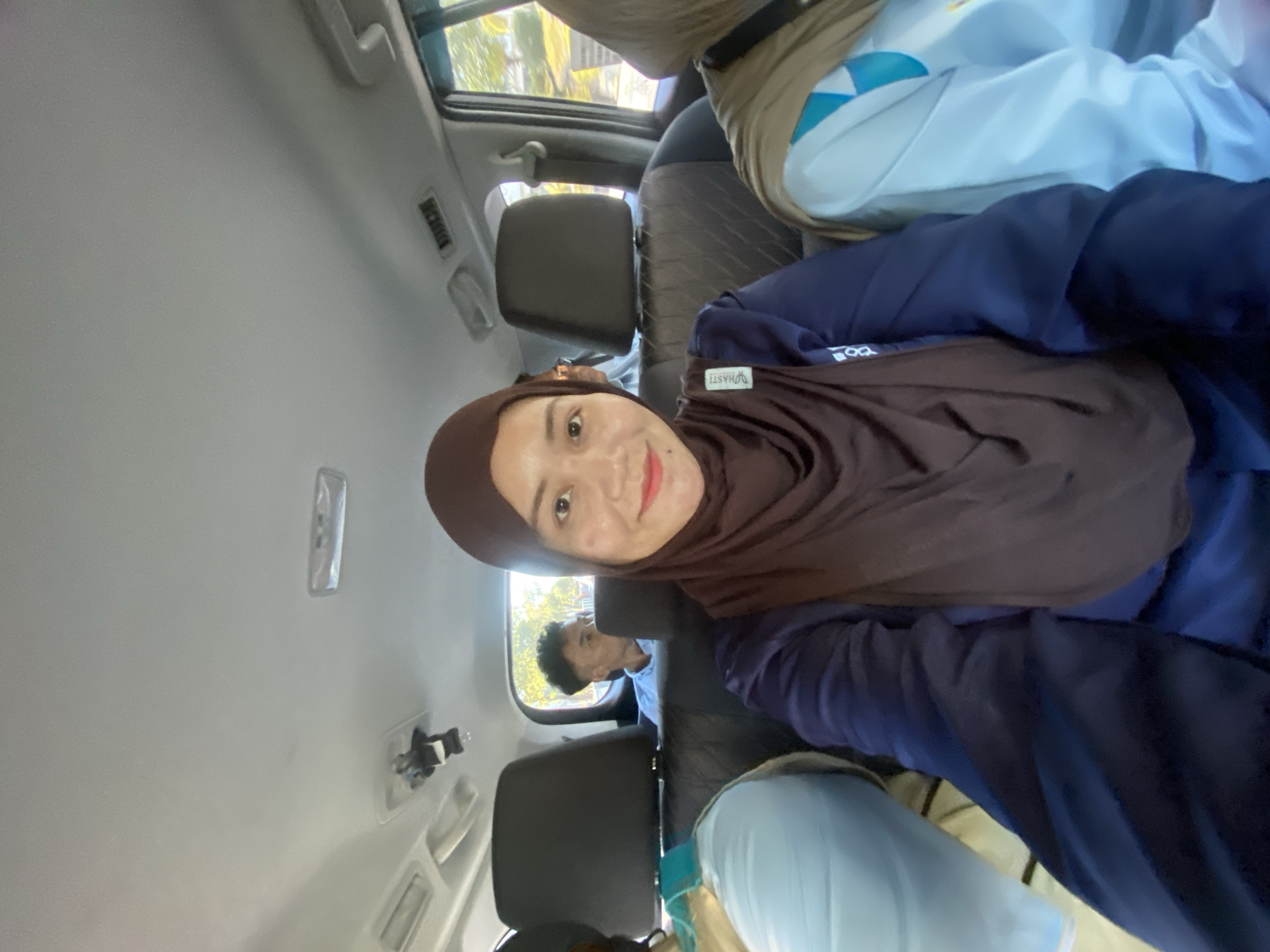 Quick snapshots from inside a car navigating Banjarmasin traffic