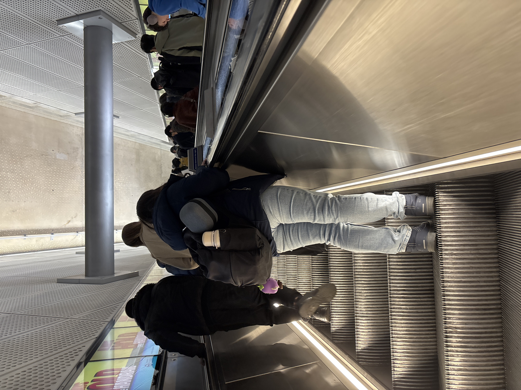 Commuters use escalator during morning hours in London