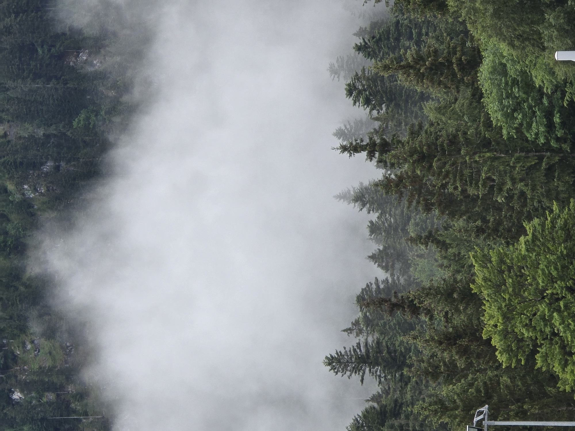 Misty dawn documented at Zugspitze cable car station, Grainau