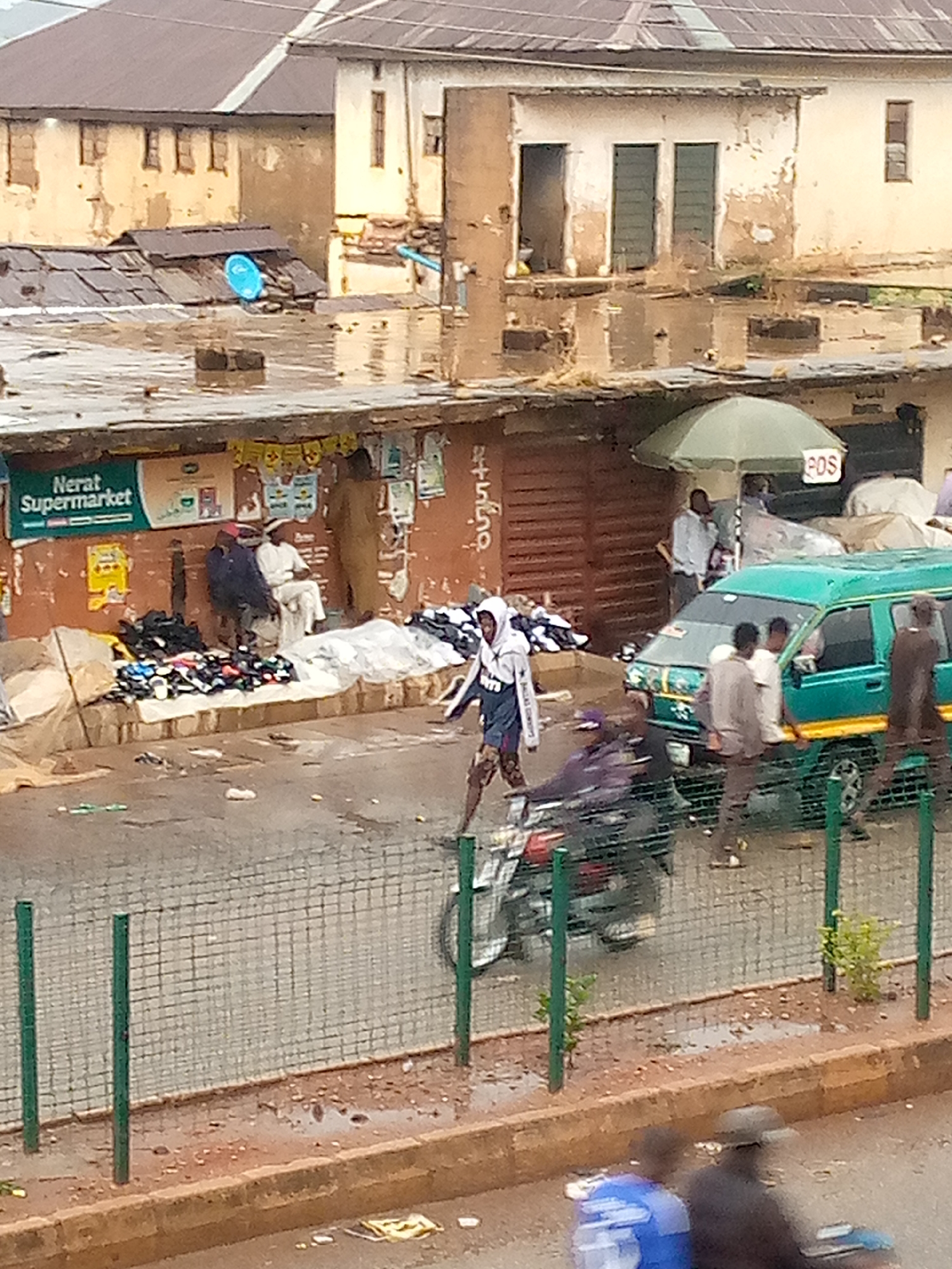 Urban daily life captured across streets and shops
