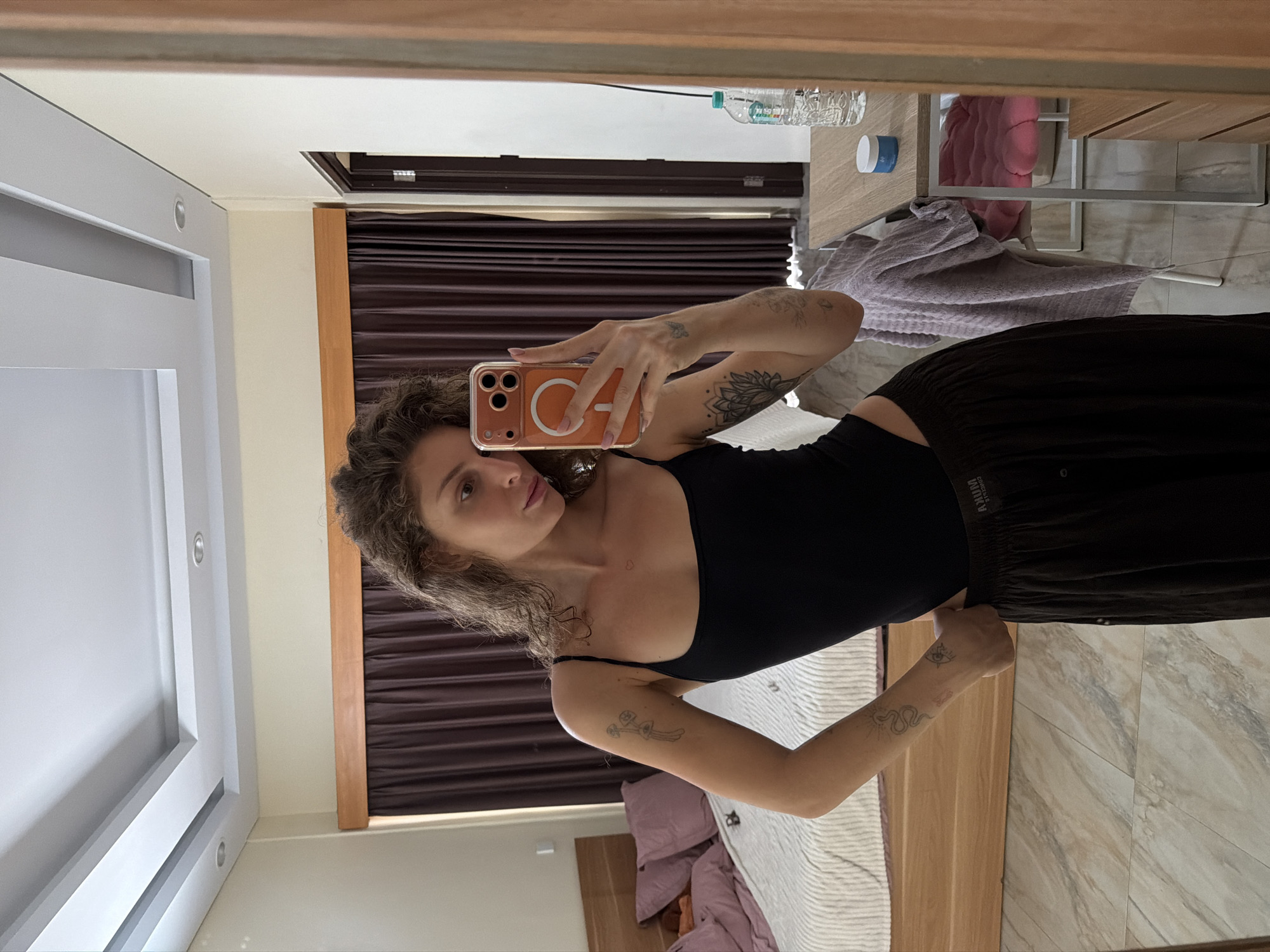 Woman takes mirror selfies in North Kuta bedroom