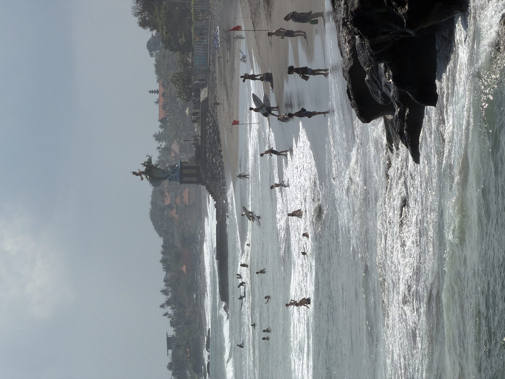 Kuta Beach surf session and shoreline activity, Bali