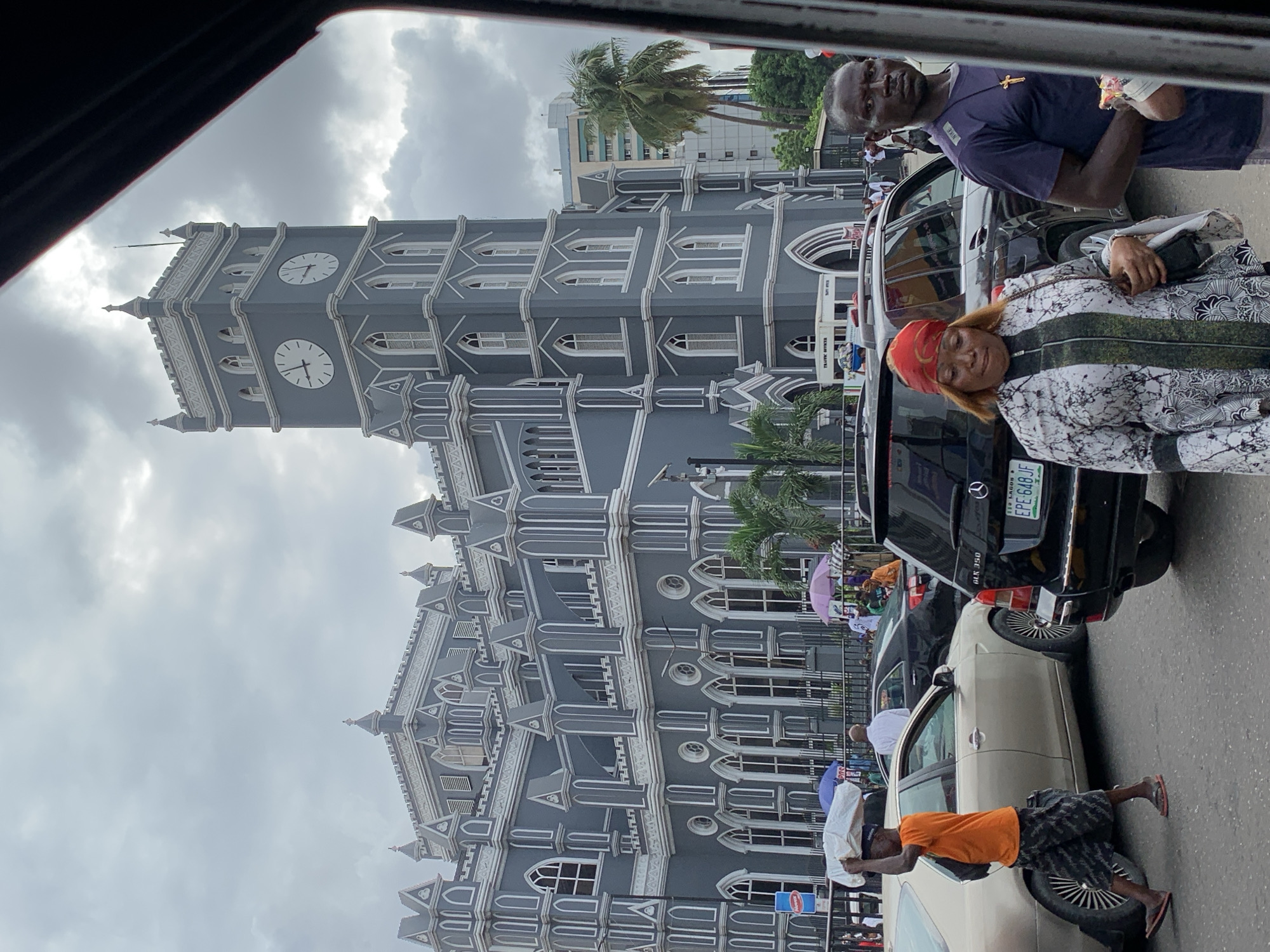 Morning street activity captured near Lagos cathedral