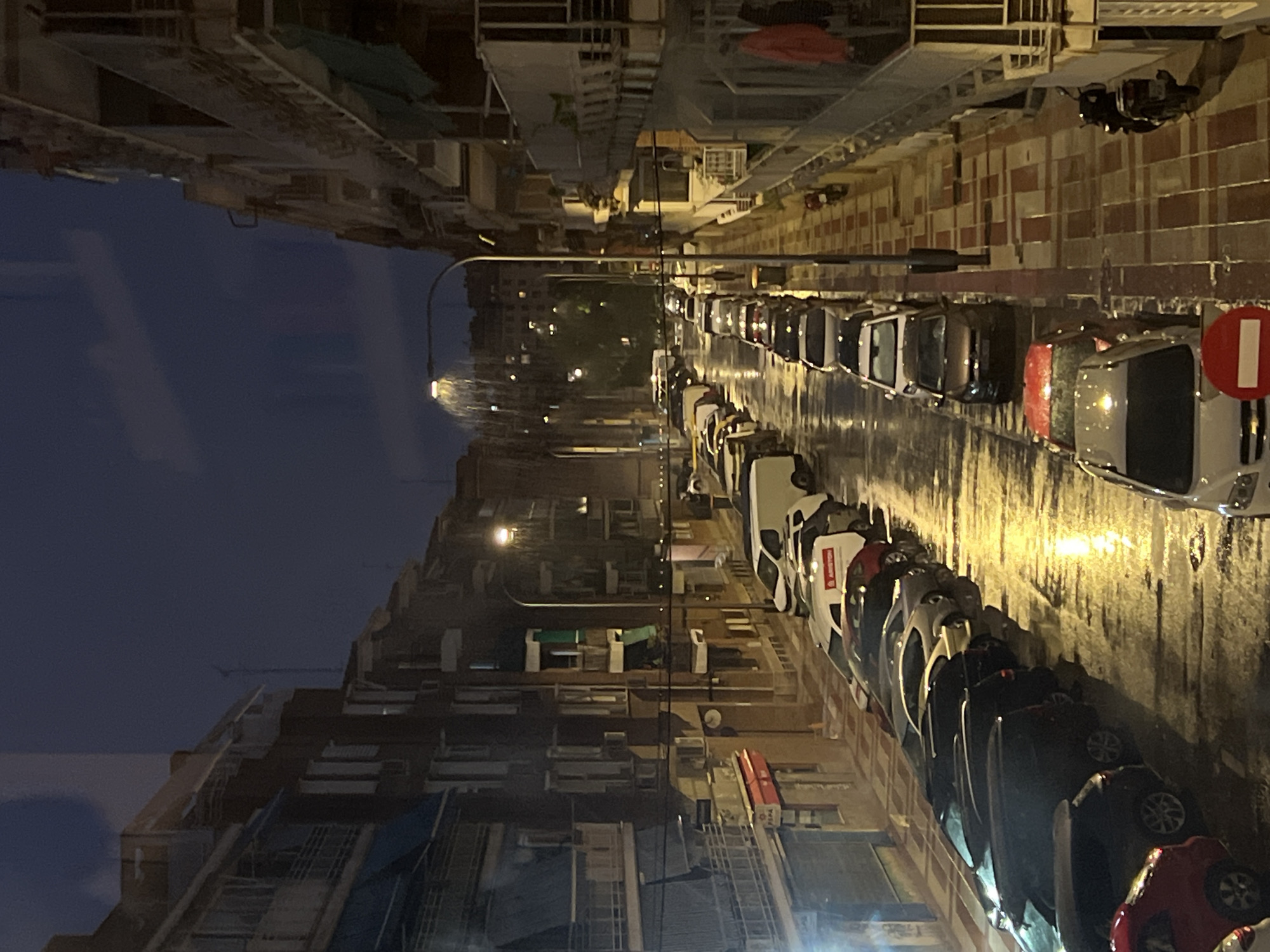 Rainy Madrid evening mixing street scenes with home interiors