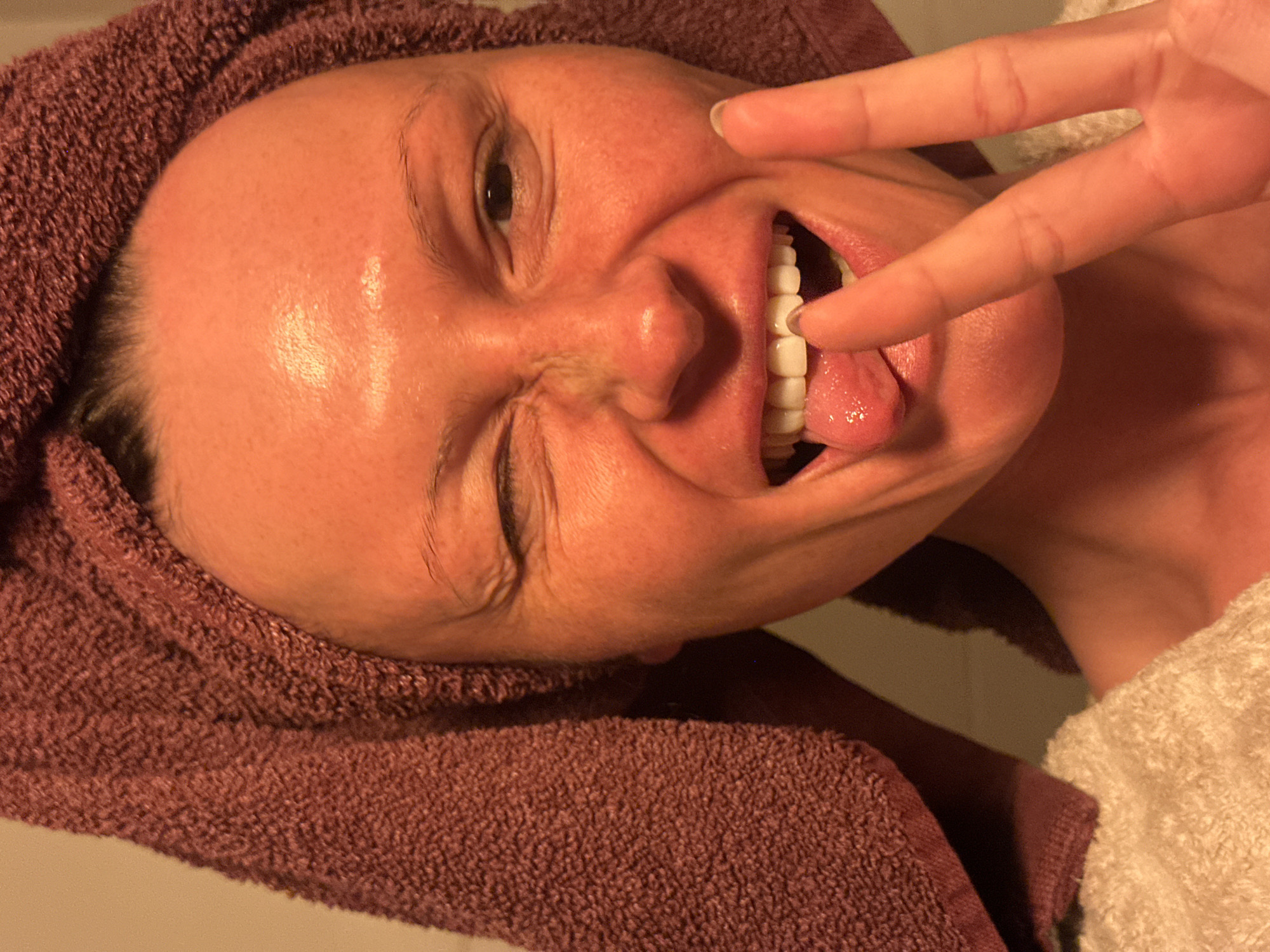 Evening skincare routine documented through bathroom selfies in Wealden