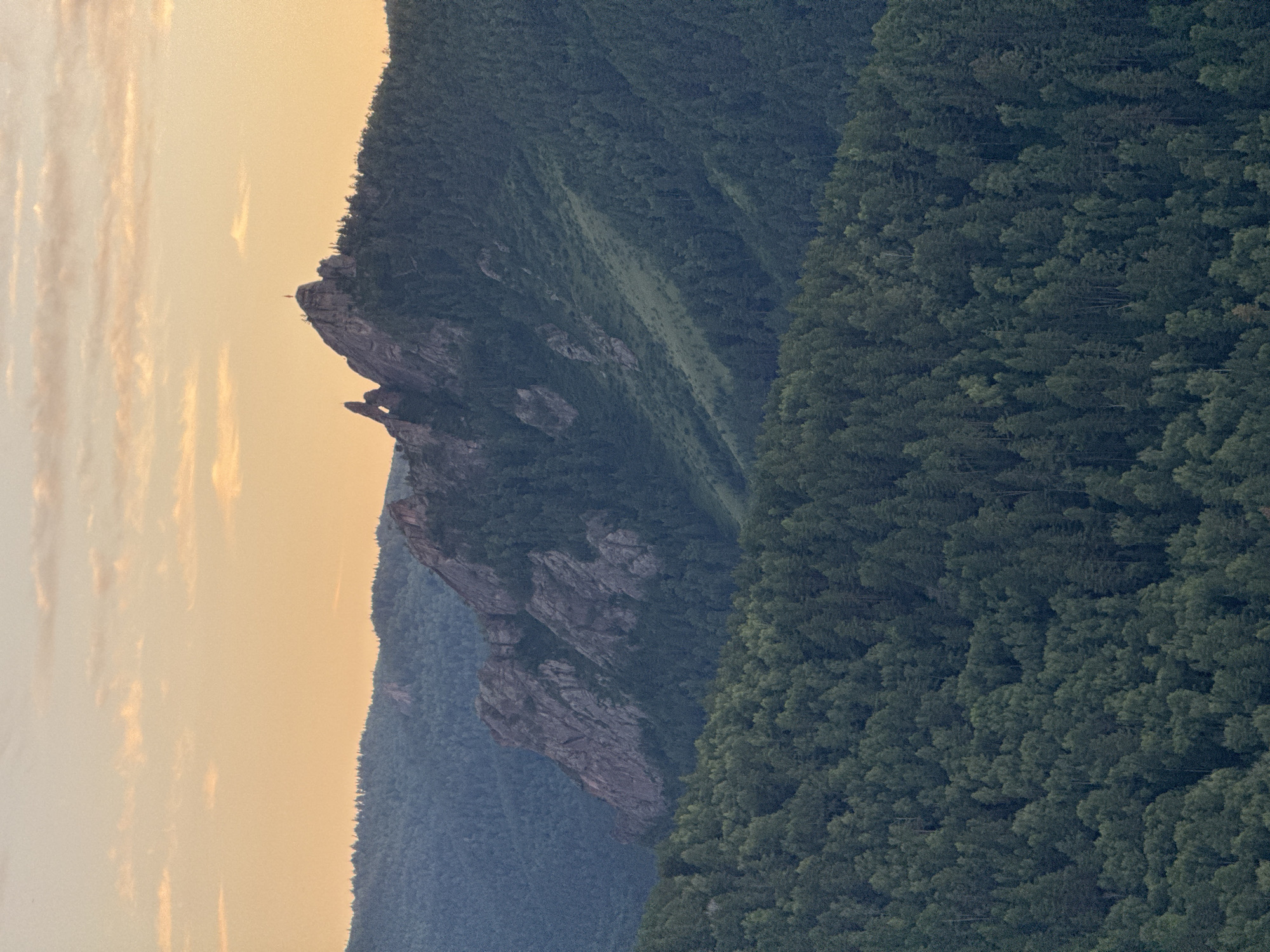 Sunset across Stolby Nature Reserve and Krasnoyarsk's hillside panoramas