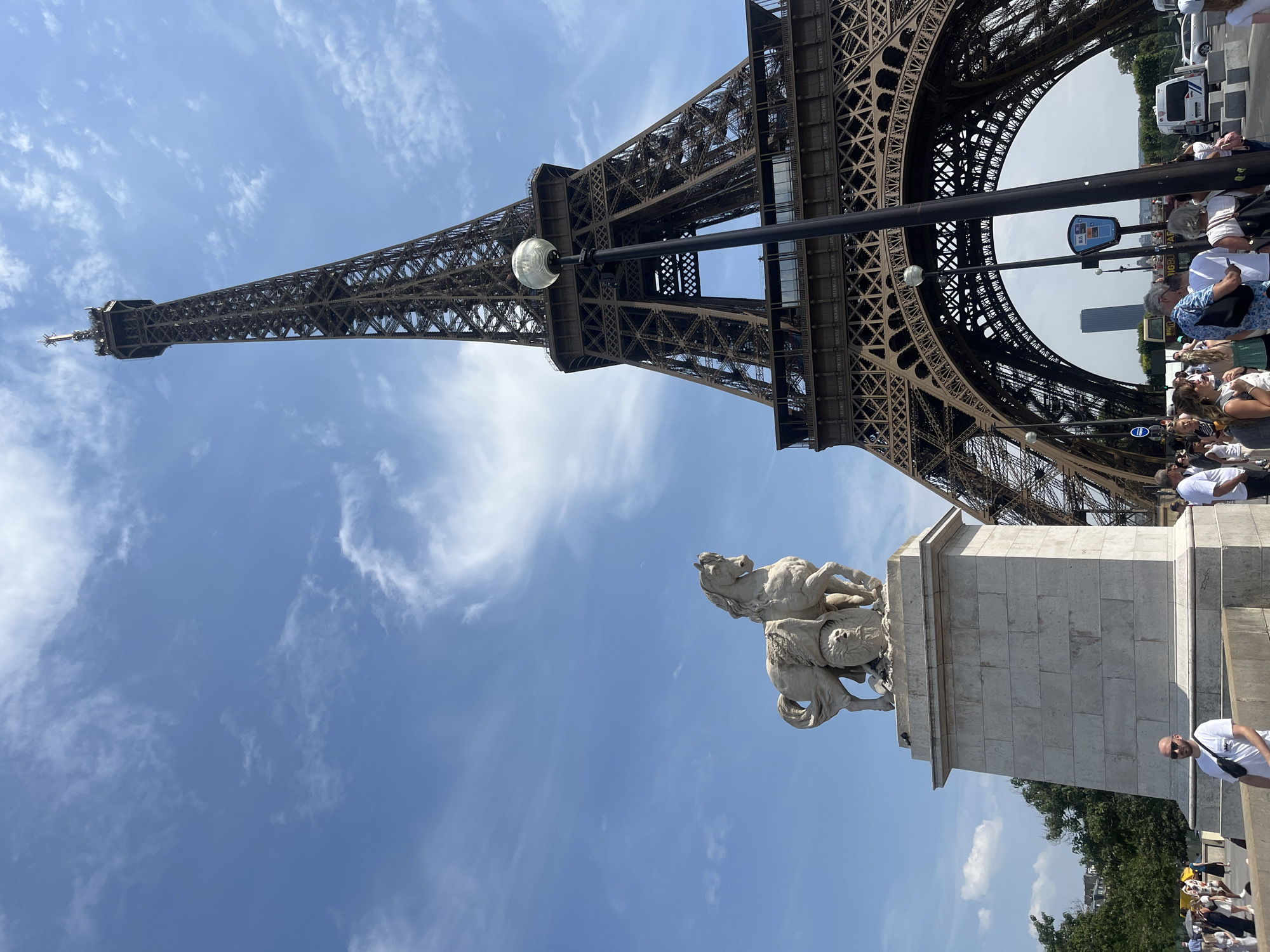 Eiffel Tower from below on a clear summer afternoon